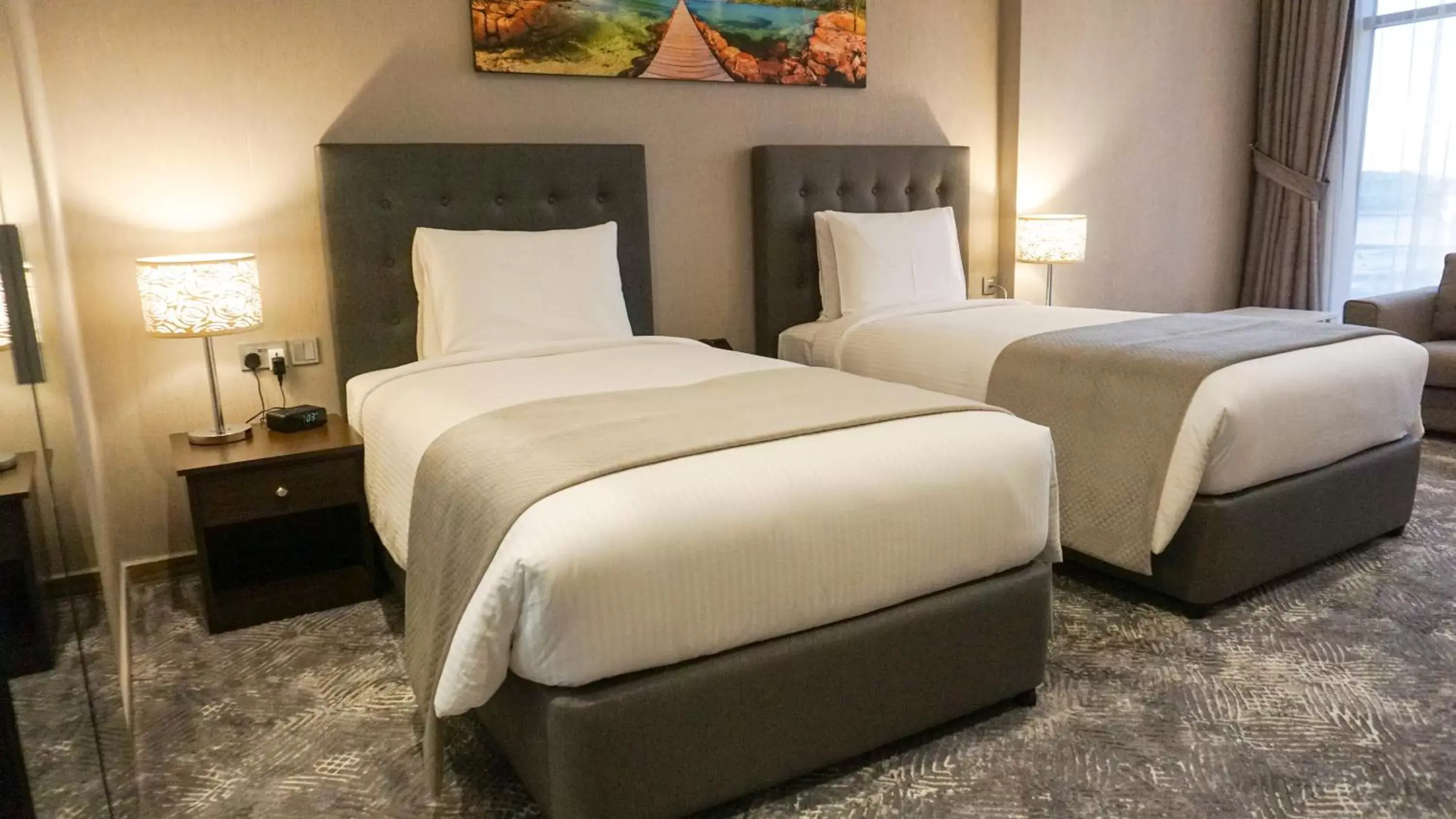 Shower, Bed in Al Kout Beach Hotel Shower, Bed in Al Kout Beach Hotel