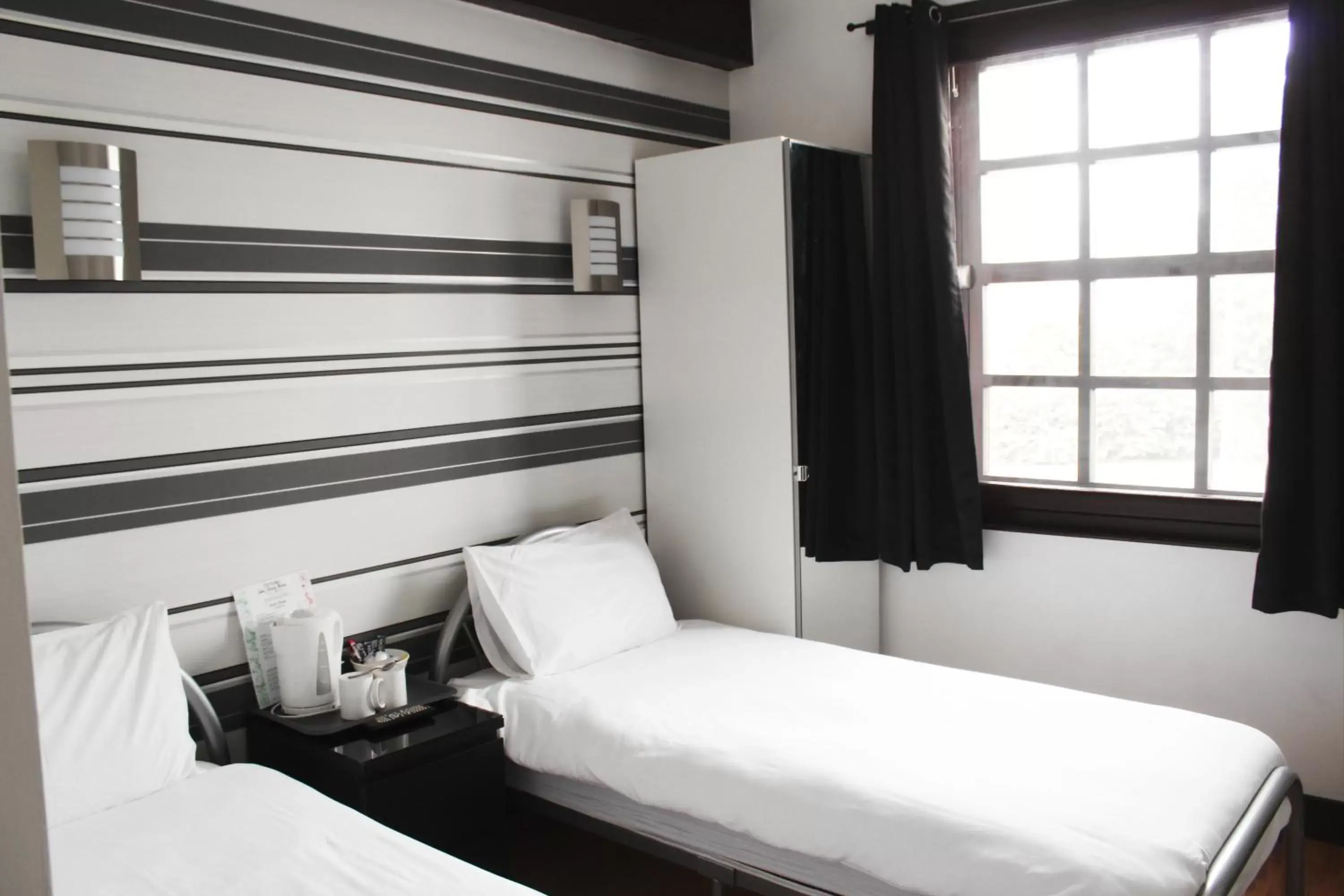 Bed in Cornmill Hotel