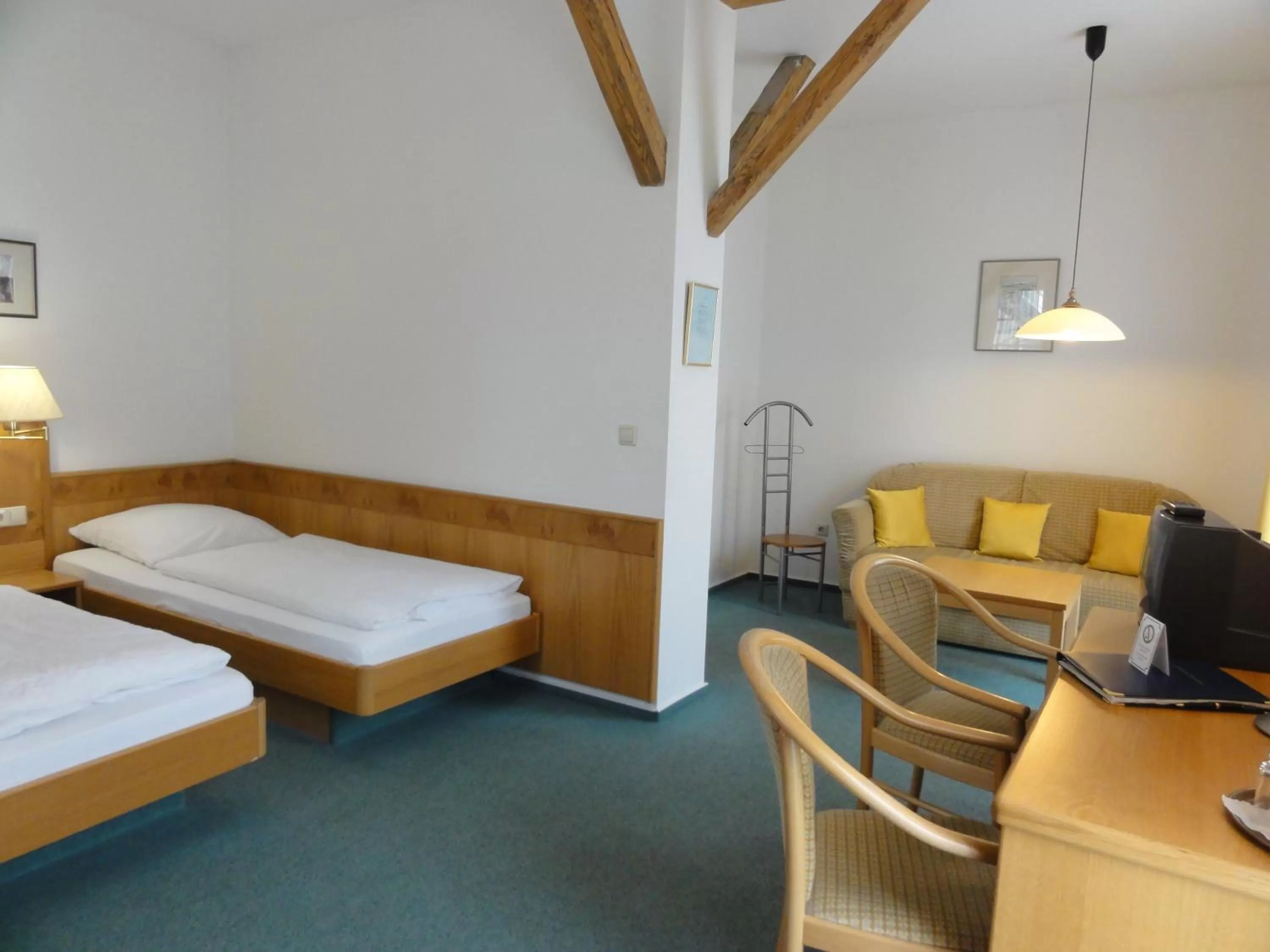 Photo of the whole room, Bed in Hotel Württemberger Hof Garni