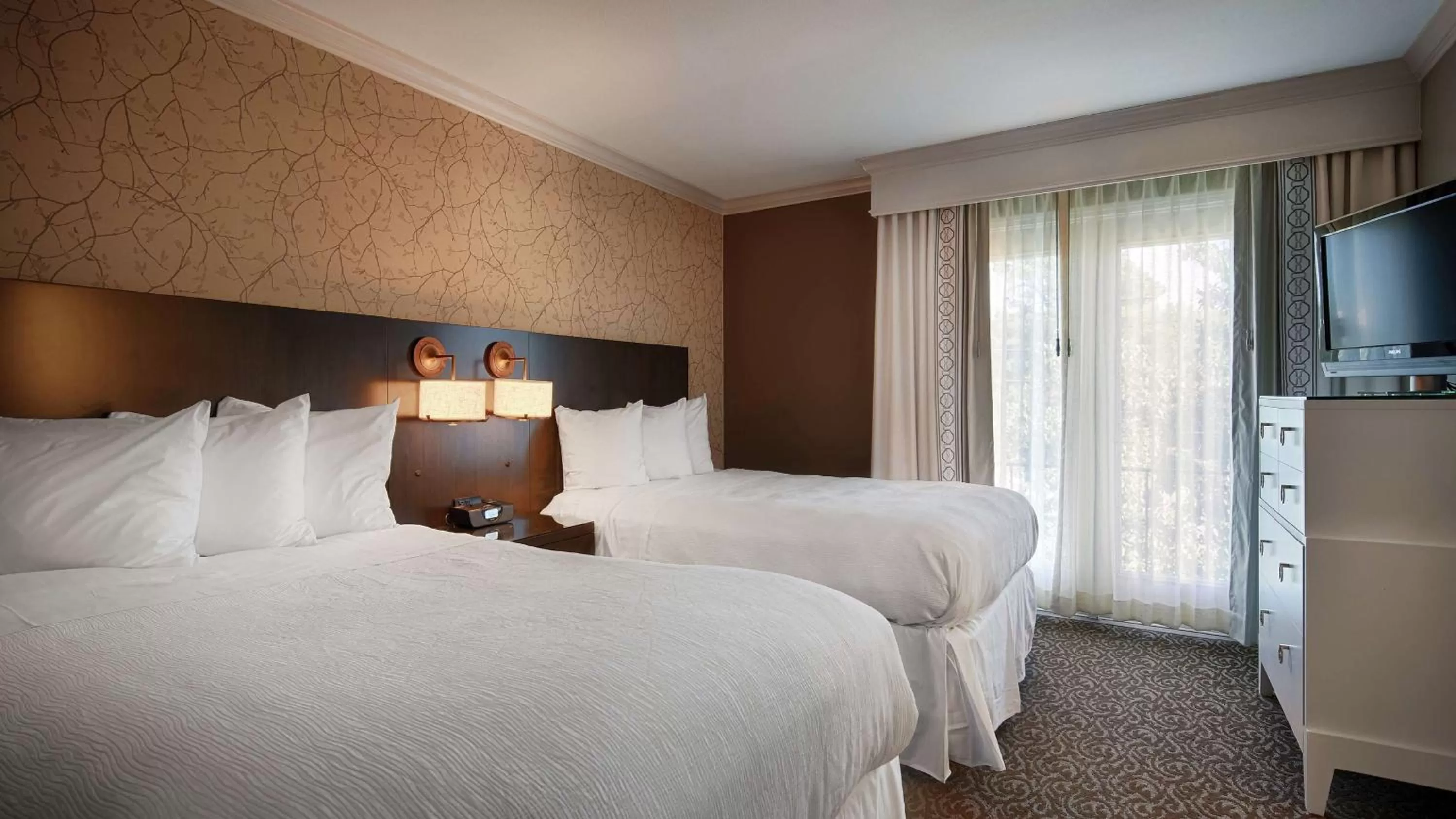 Bed in The Burgundy Hotel, Tapestry Collection by Hilton