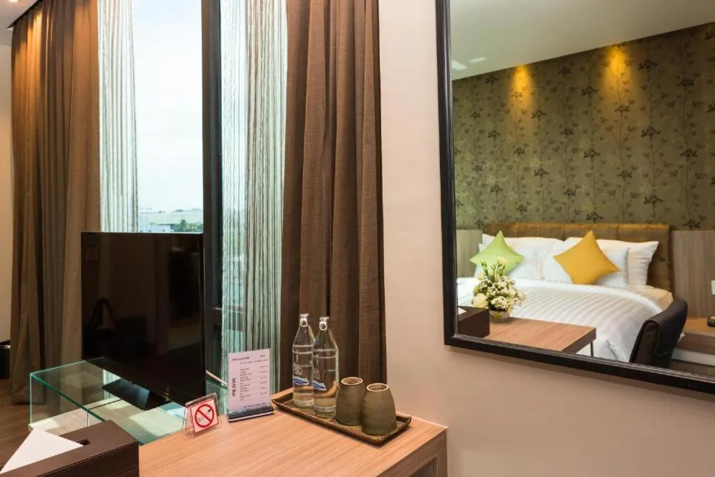 Bed in Tonaoi Grand Hotel