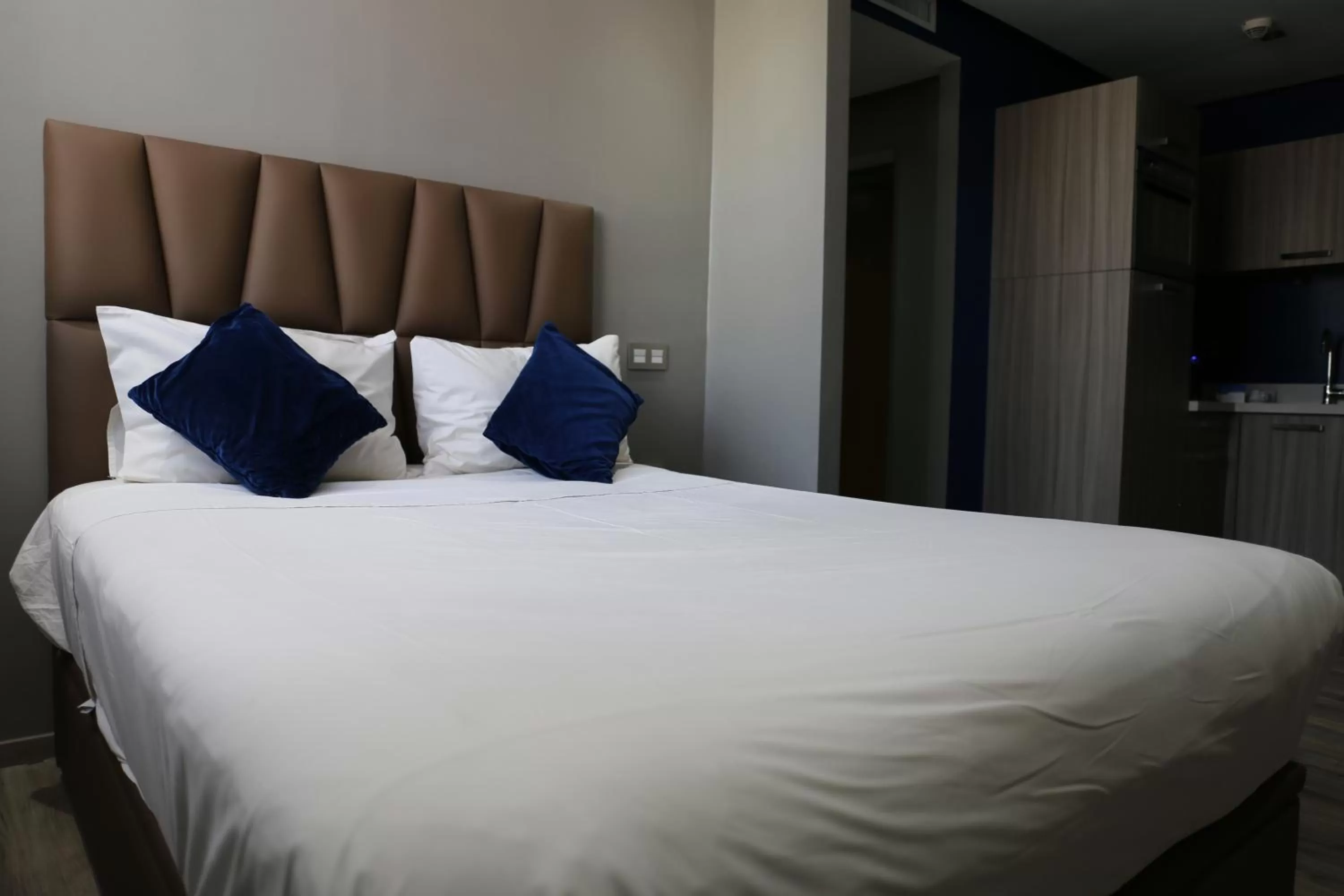 Bed in Le 22 Appart'Hotel