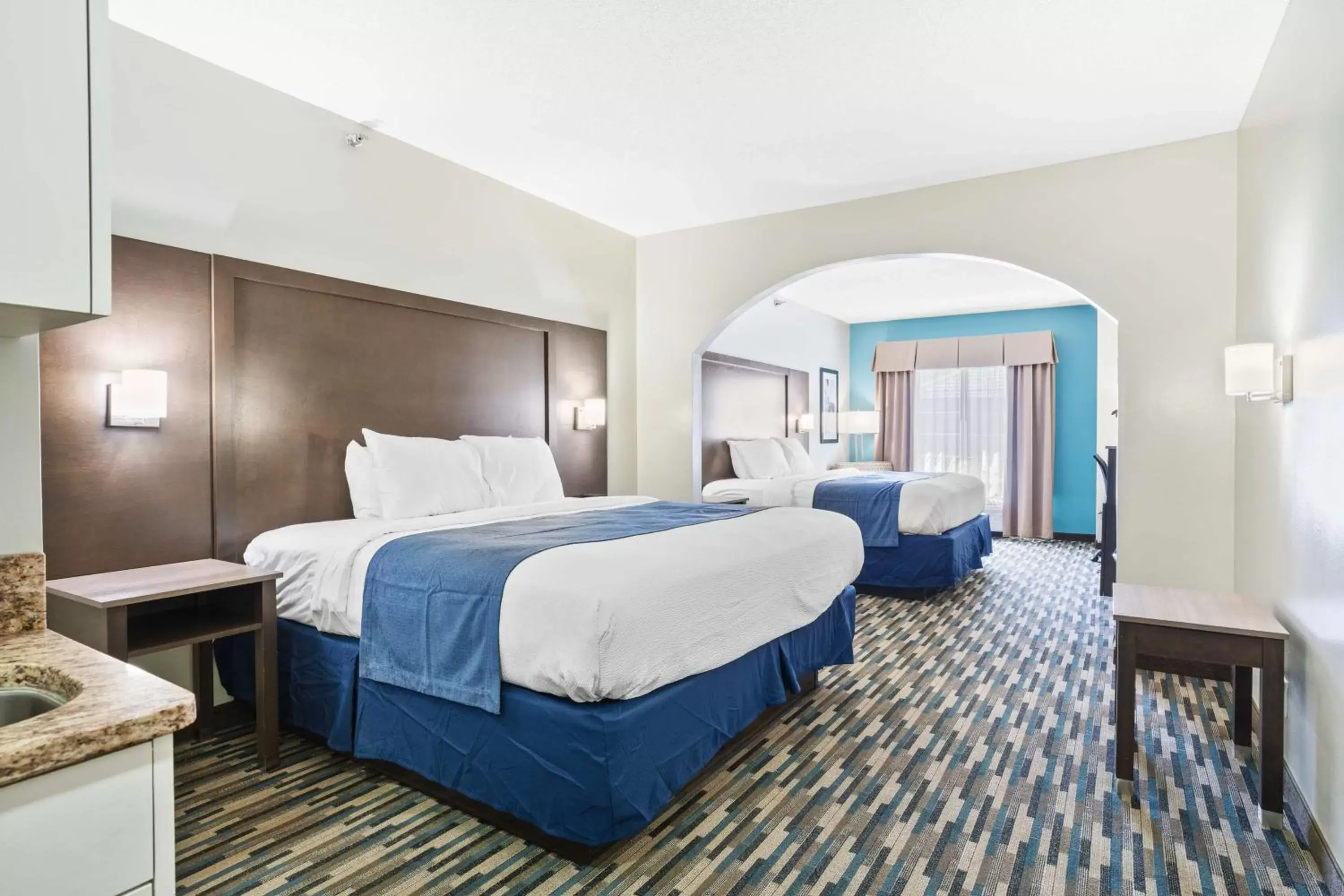 Bedroom, Bed in Blue Water Inn & Suites BW Signature Collection