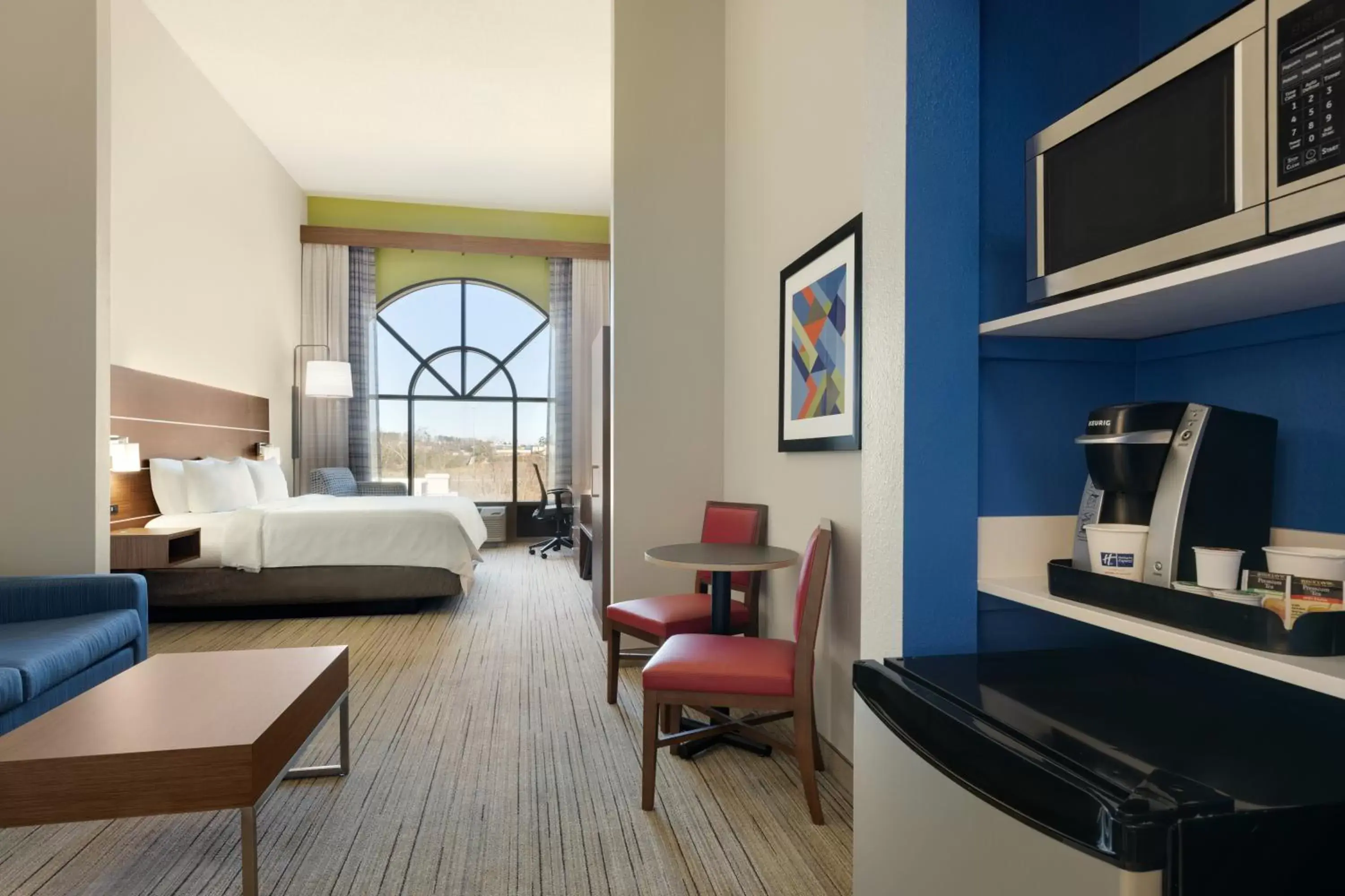 Bedroom in Holiday Inn Express Hotel & Suites Opelika Auburn, an IHG Hotel