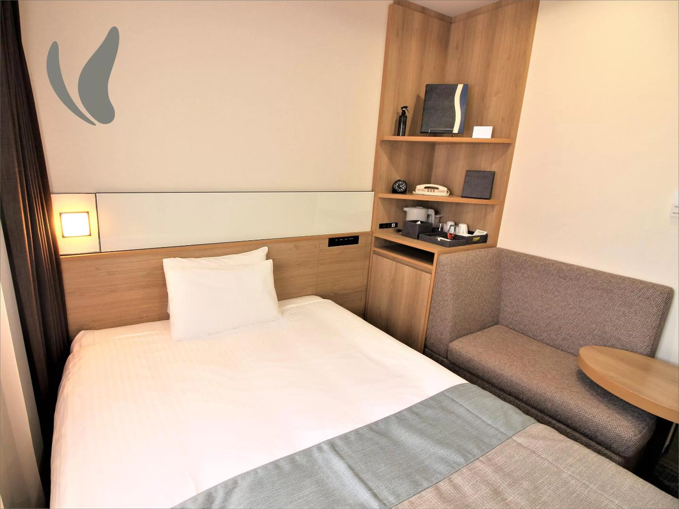 Bed in Hotel Hokke Club Naha Shintoshin