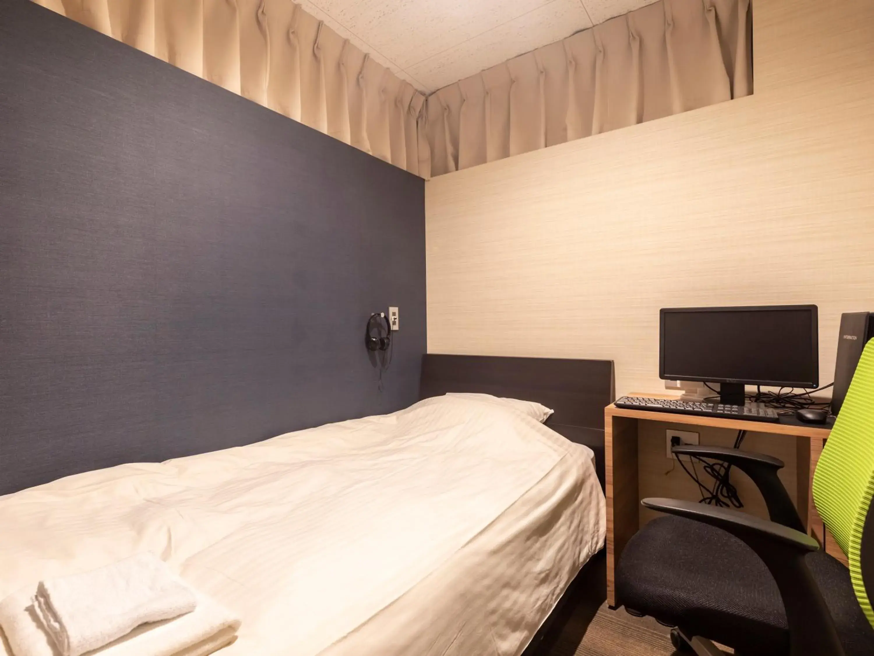 Photo of the whole room, Bed in Tabist Hotel Smart Sleeps Oita Station