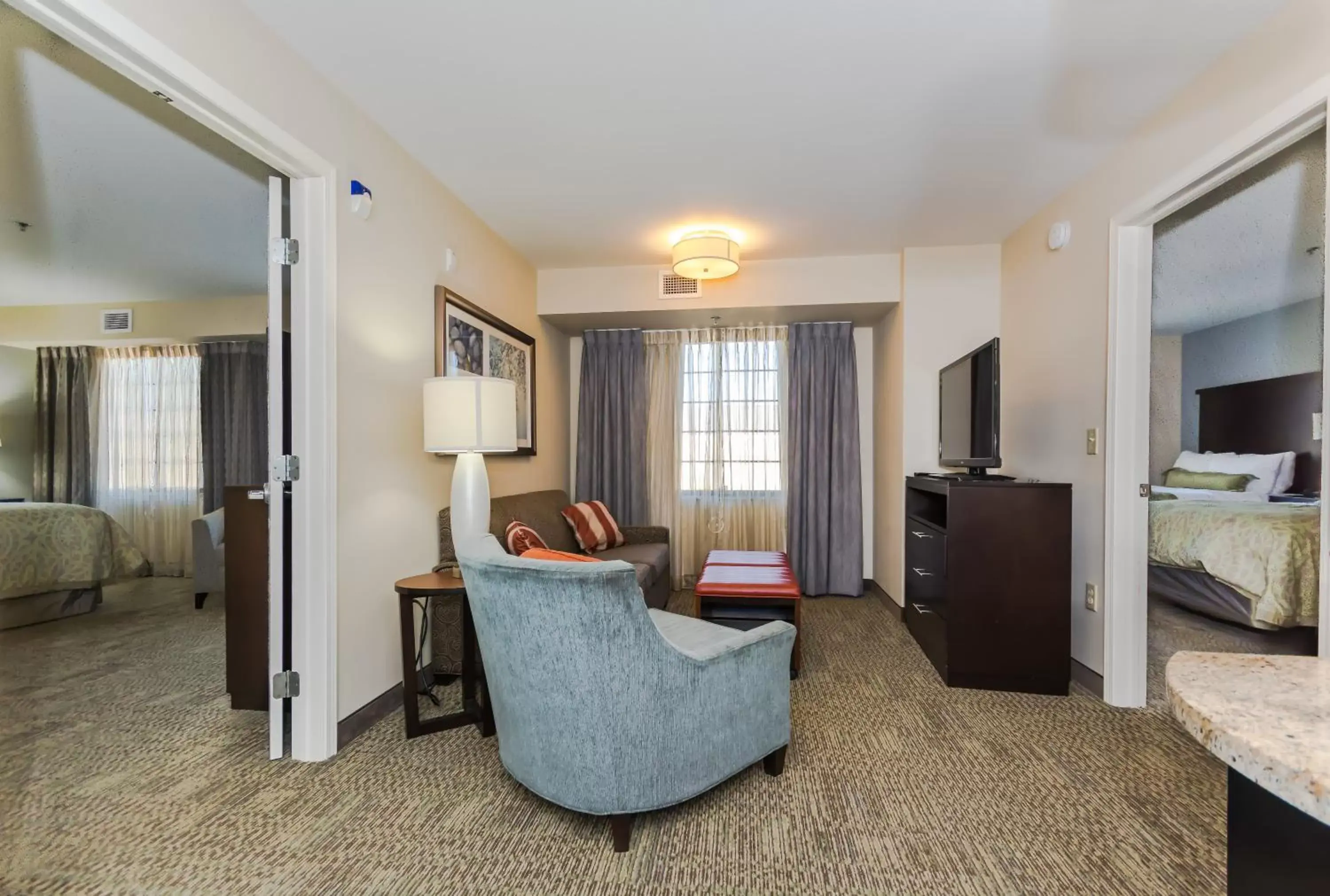 Photo of the whole room, Seating Area in Staybridge Suites Grand Forks, an IHG Hotel