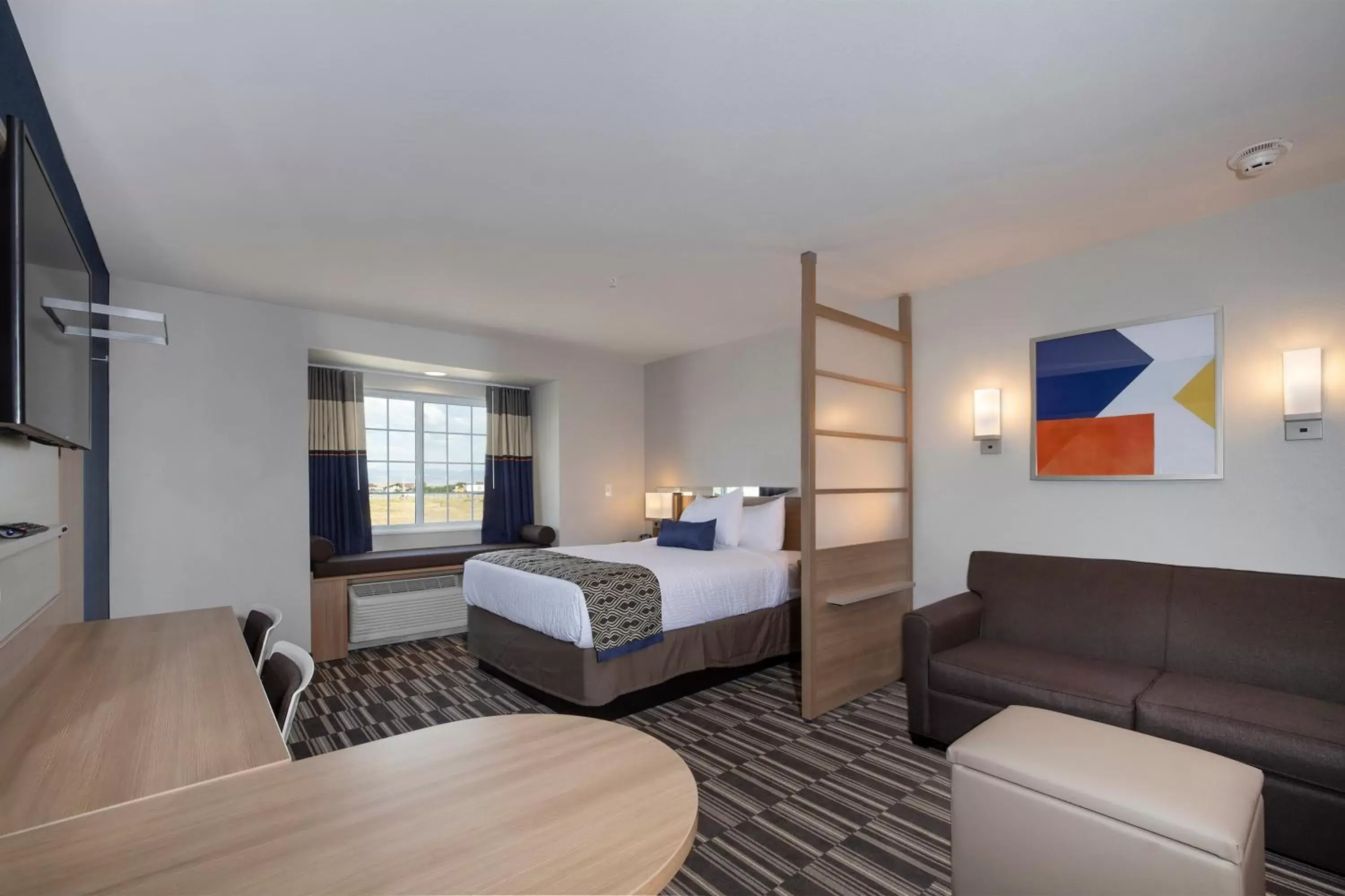 Bed in Microtel Inn & Suites by Wyndham Loveland