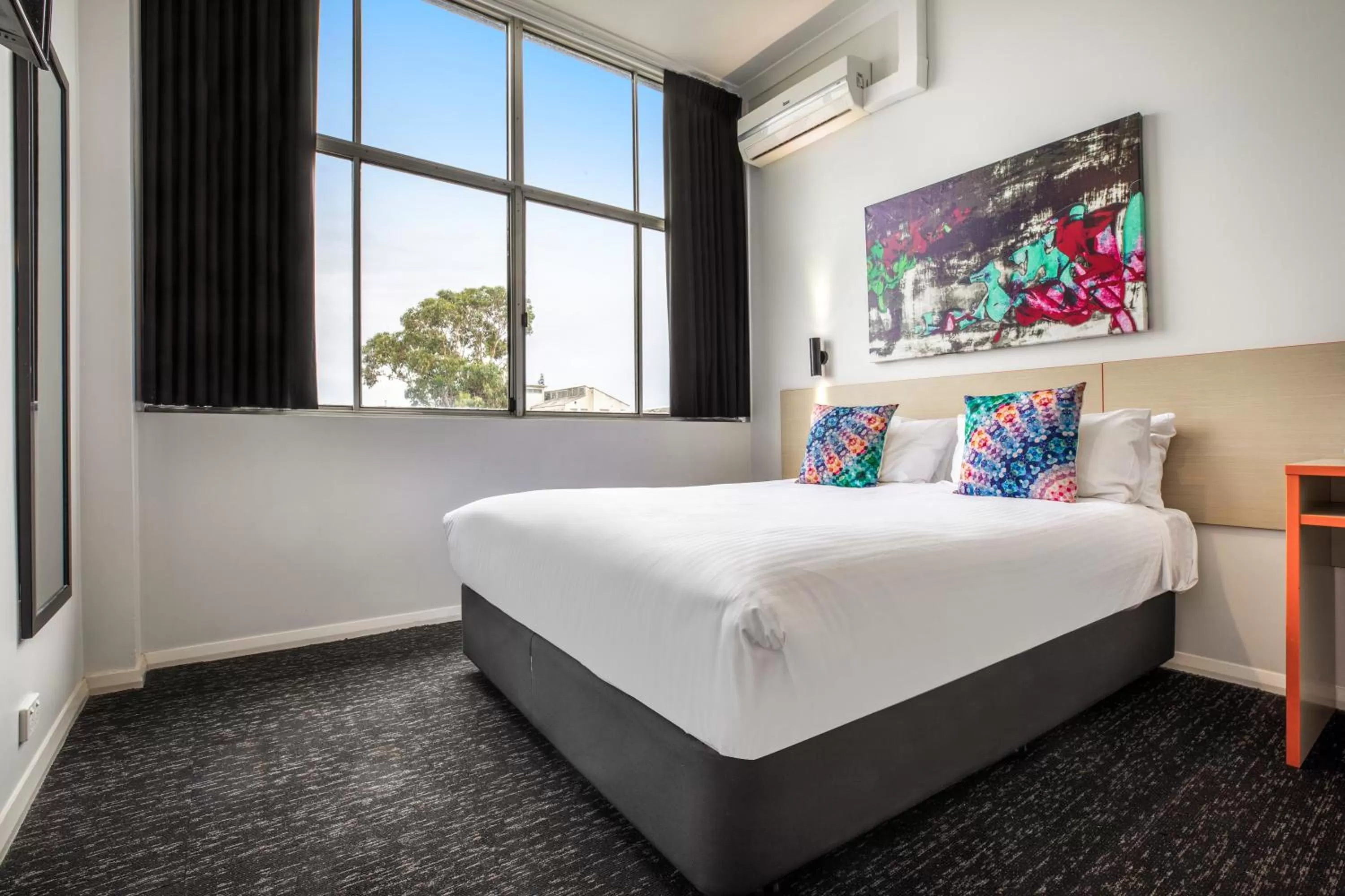 Bedroom, Bed in Nightcap at Ashley Hotel