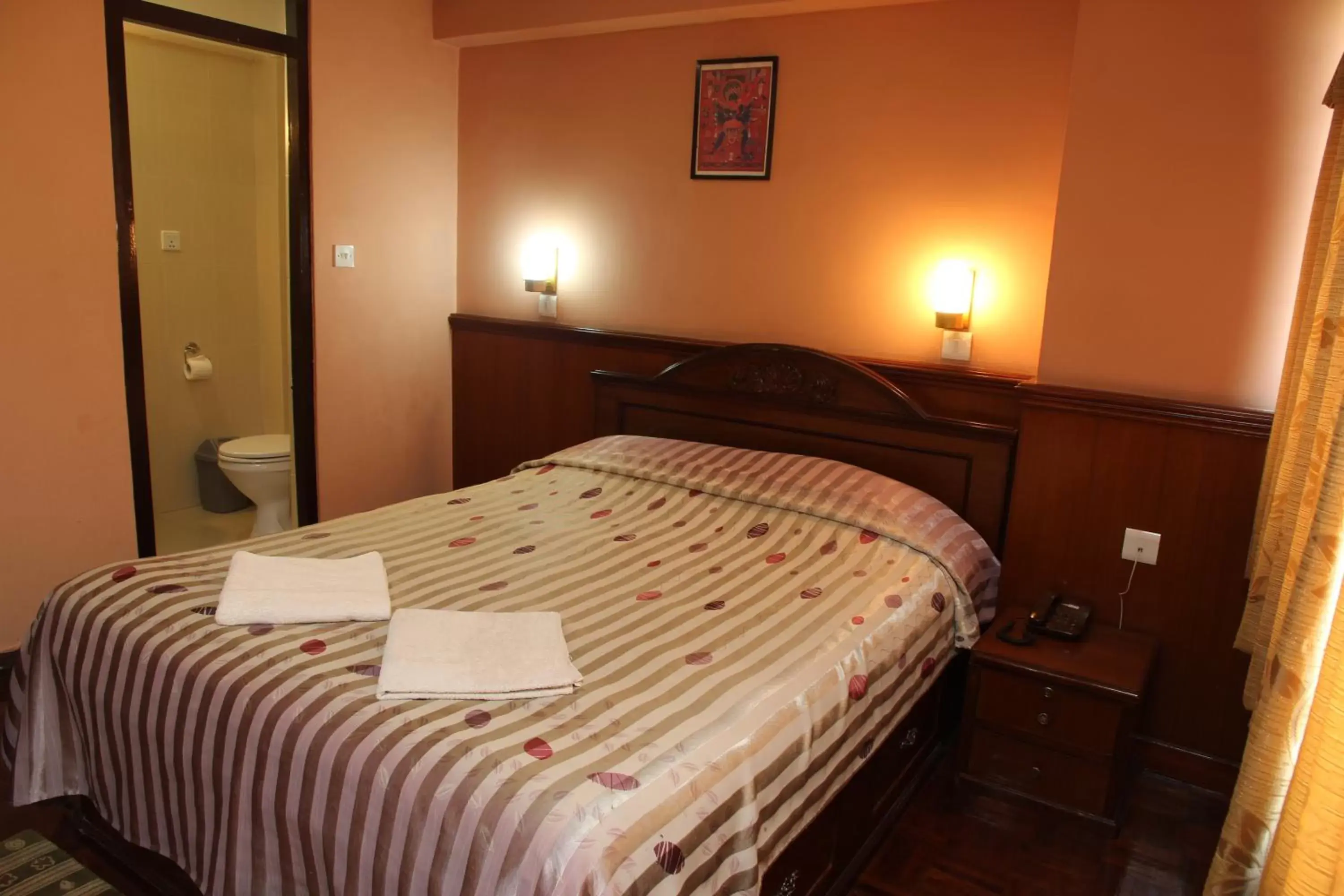 Bed in Potala Guest House