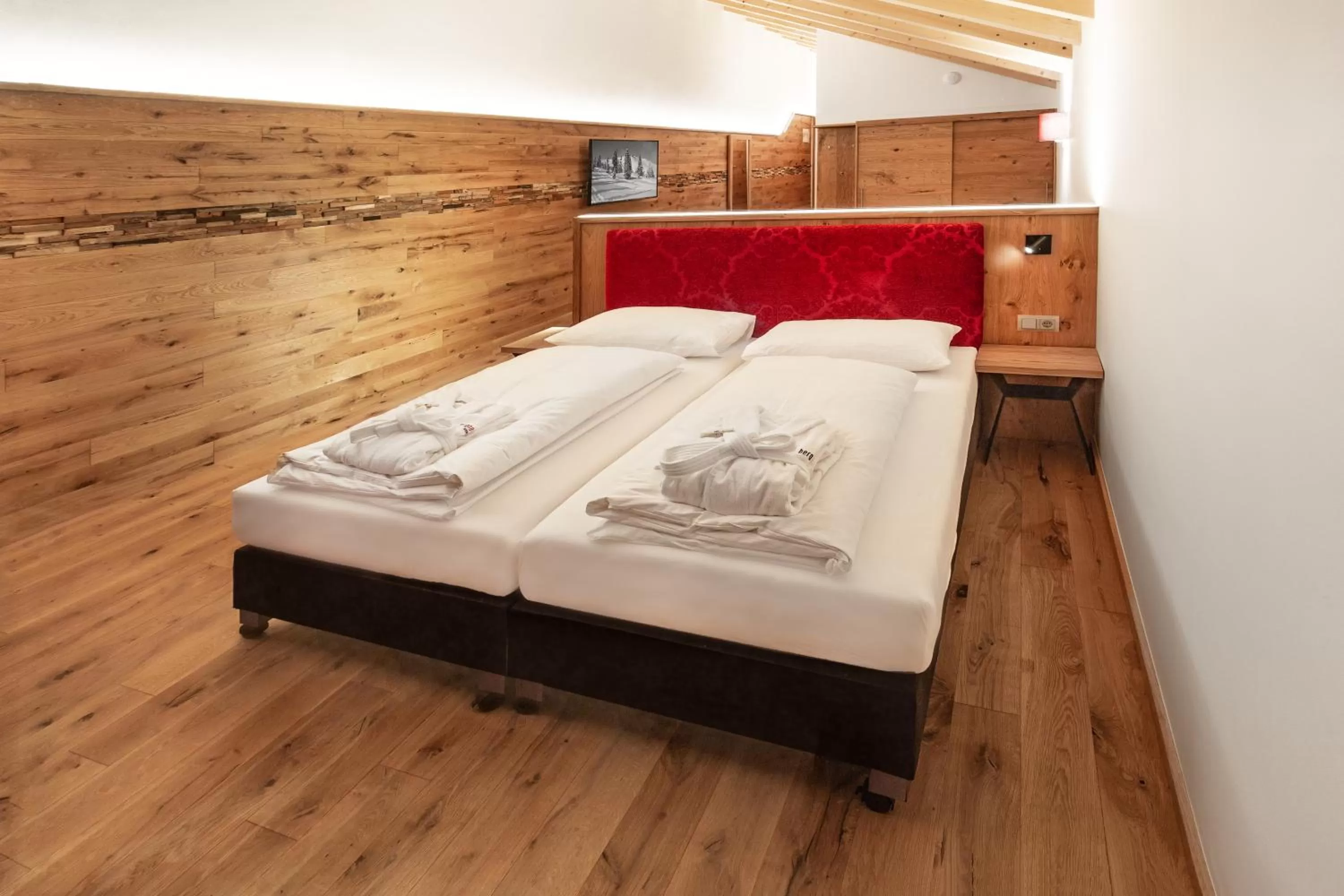 Bed in Berghotel Schmittenhöhe