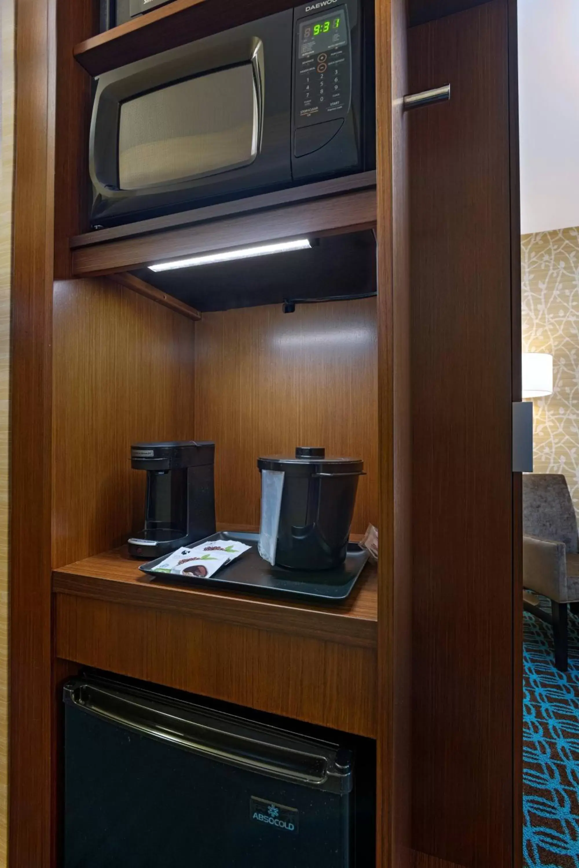 Photo of the whole room, TV/Entertainment Center in Fairfield Inn & Suites Houston Richmond