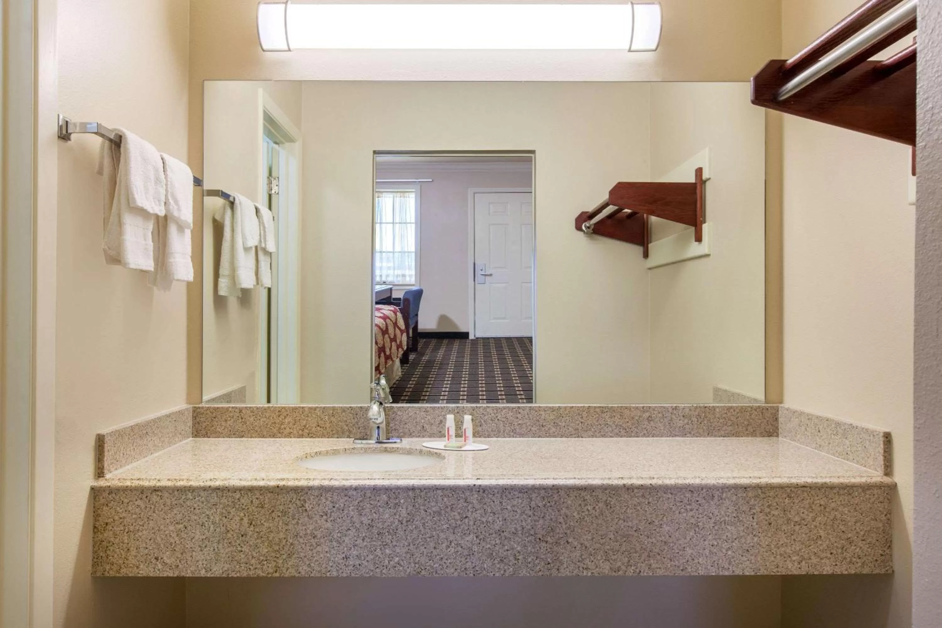 Bathroom in Super 8 by Wyndham Tyler TX