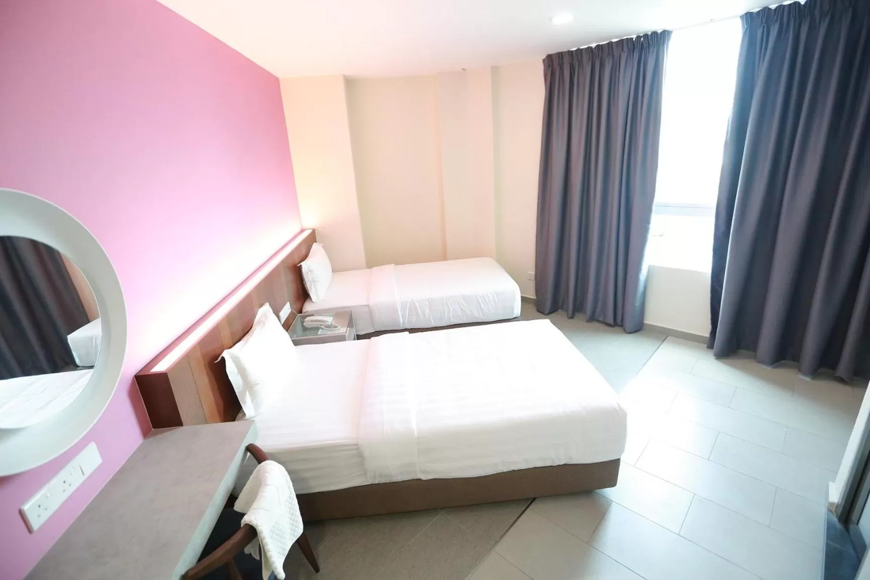 Bed in Pantai Regal Boutique Hotel