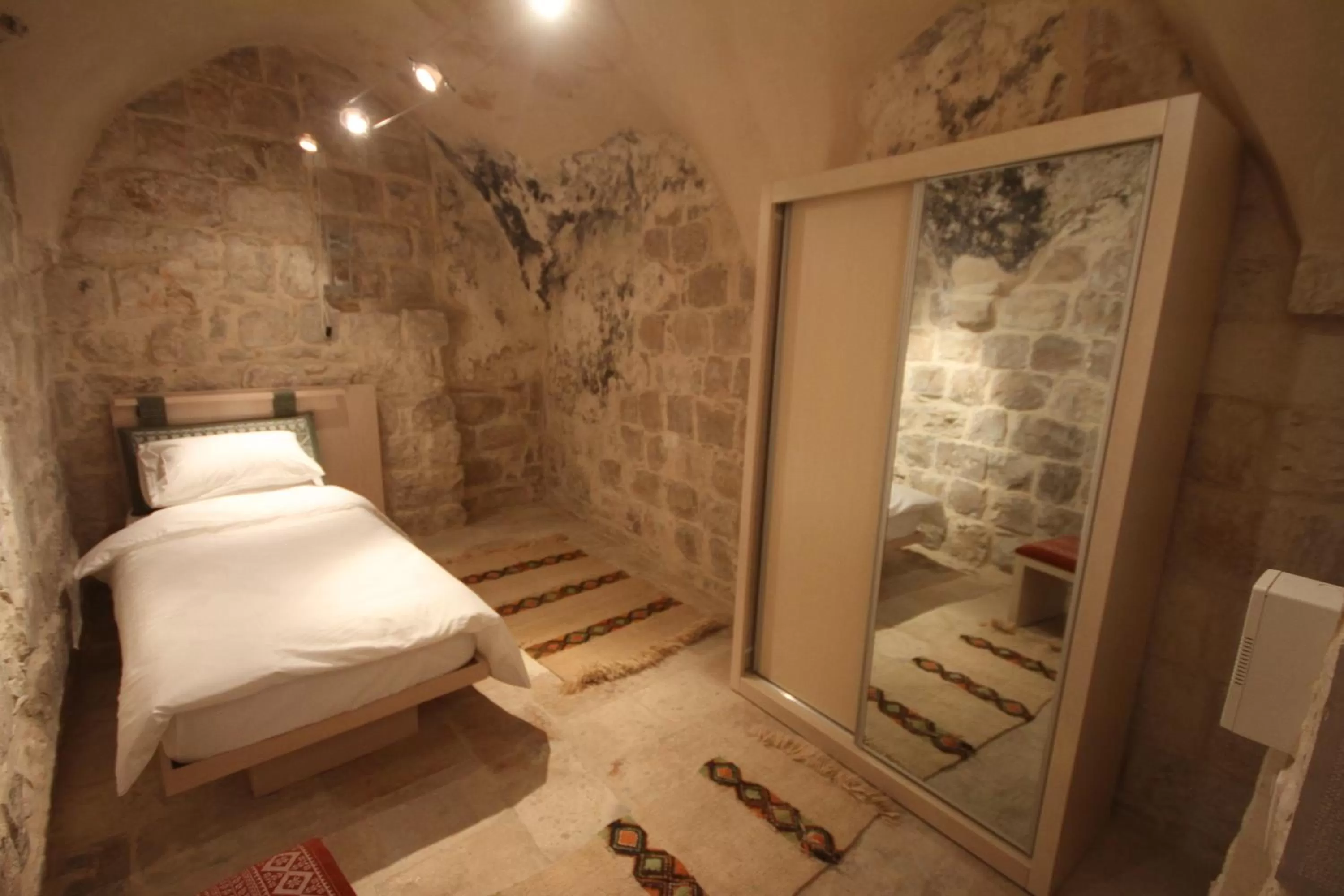 Bed in Khan Alwakala Hotel