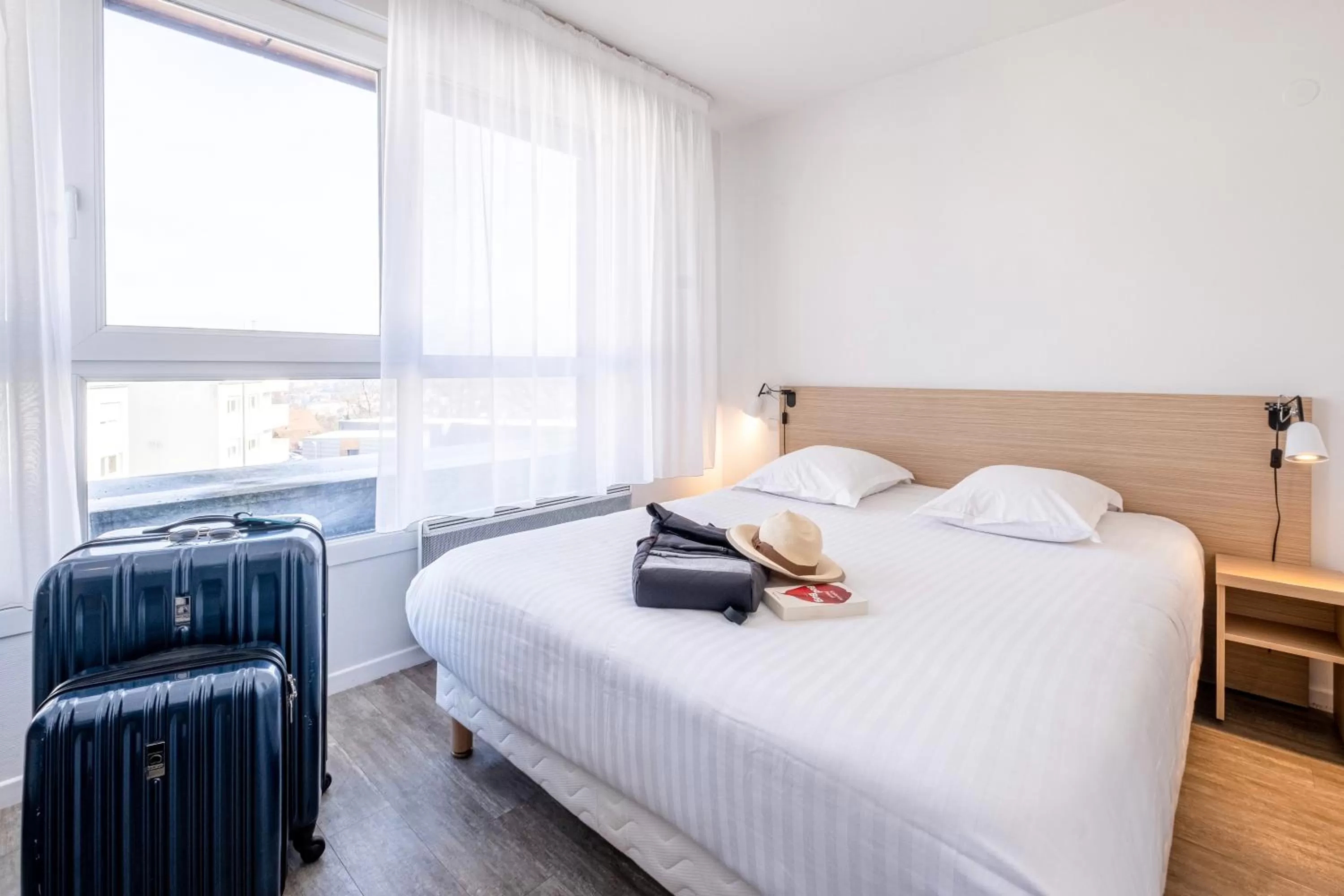 Bed in Zenitude Hôtel-Résidences Les Hauts d'Annecy