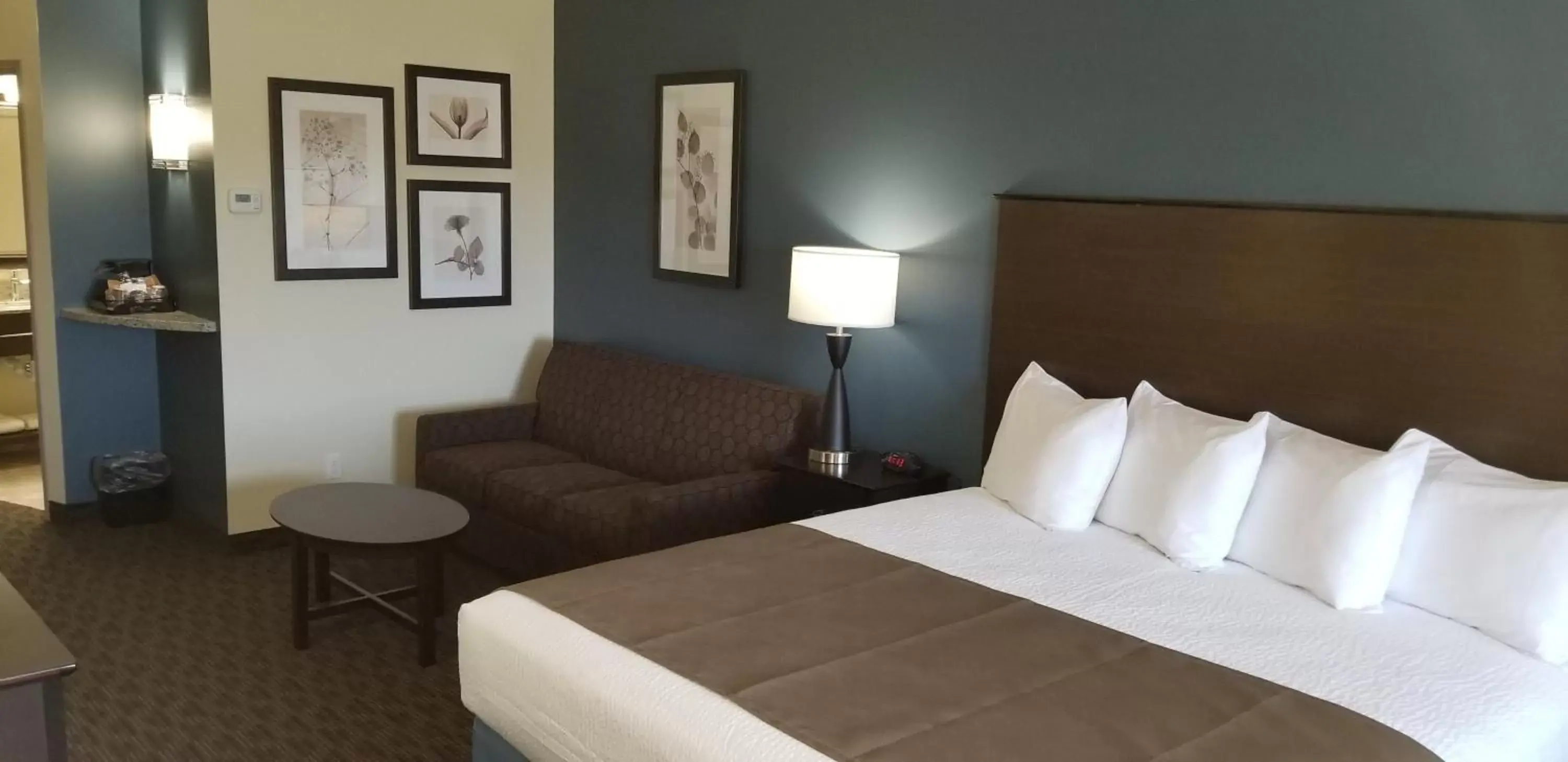 Bed in AmericInn by Wyndham Sioux Falls North