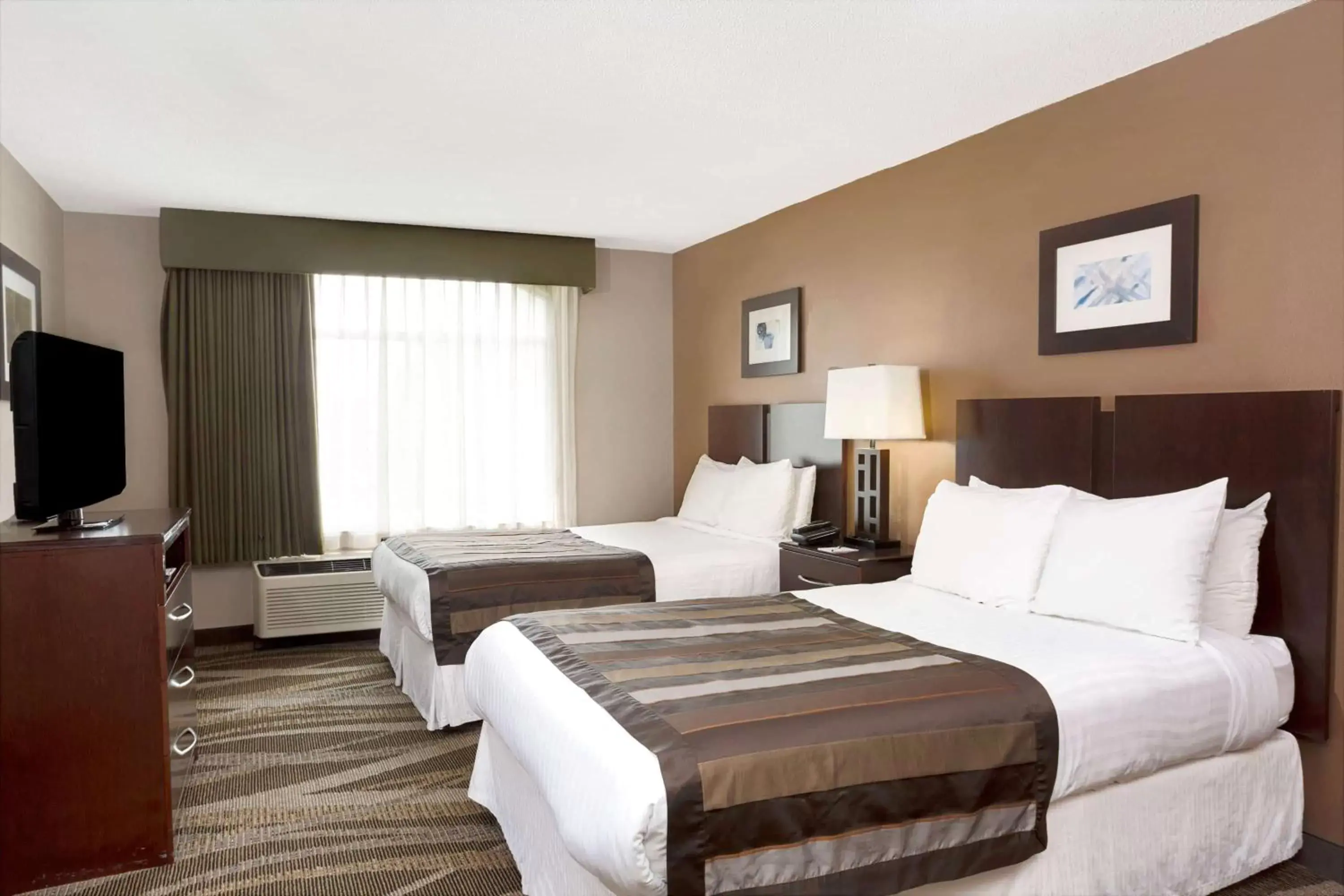 Photo of the whole room, Bed in Wingate by Wyndham Raleigh Durham / Airport