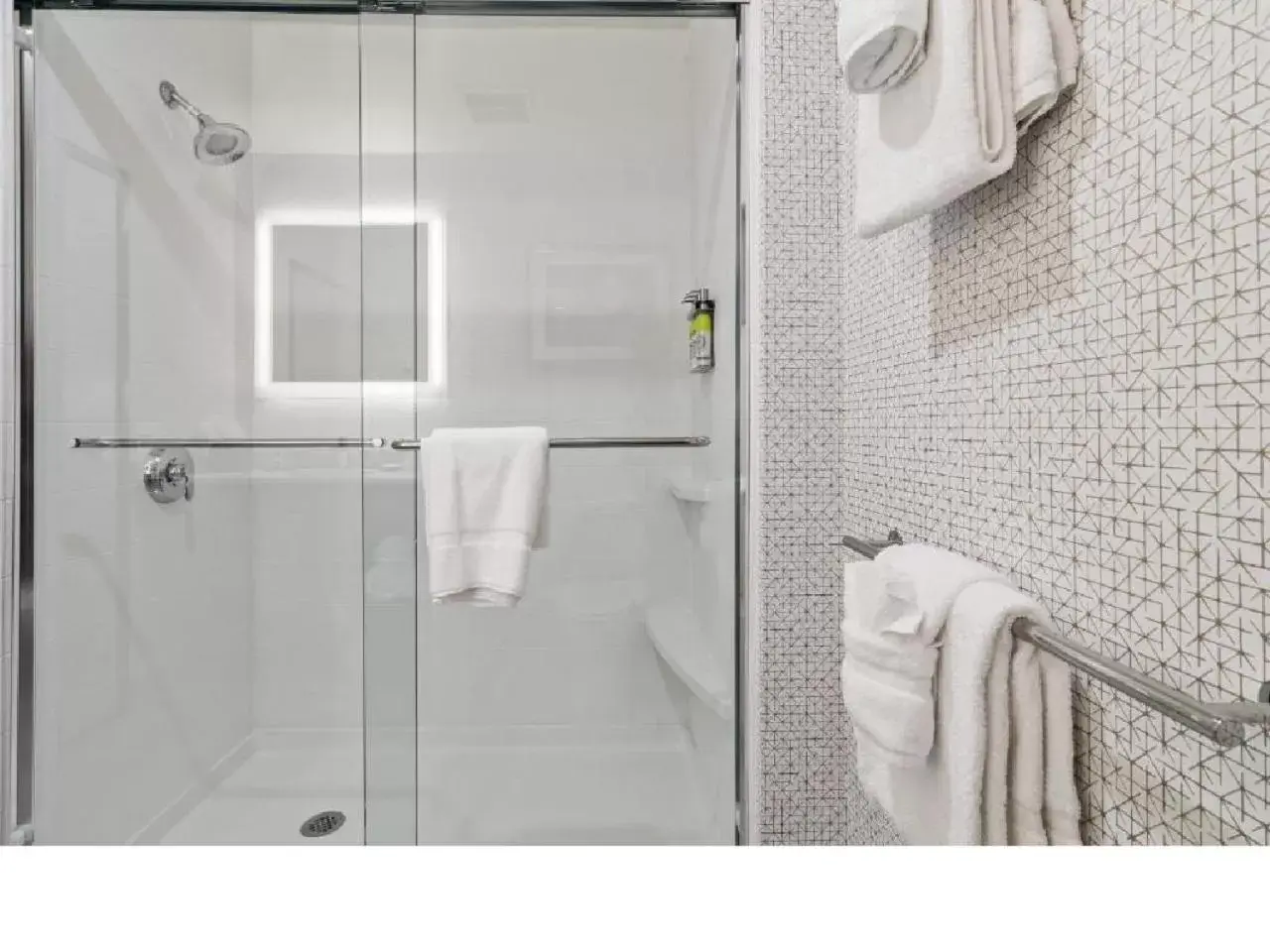 Shower, Bathroom in Holiday Inn Express & Suites Orlando- Lake Buena Vista, an IHG Hotel