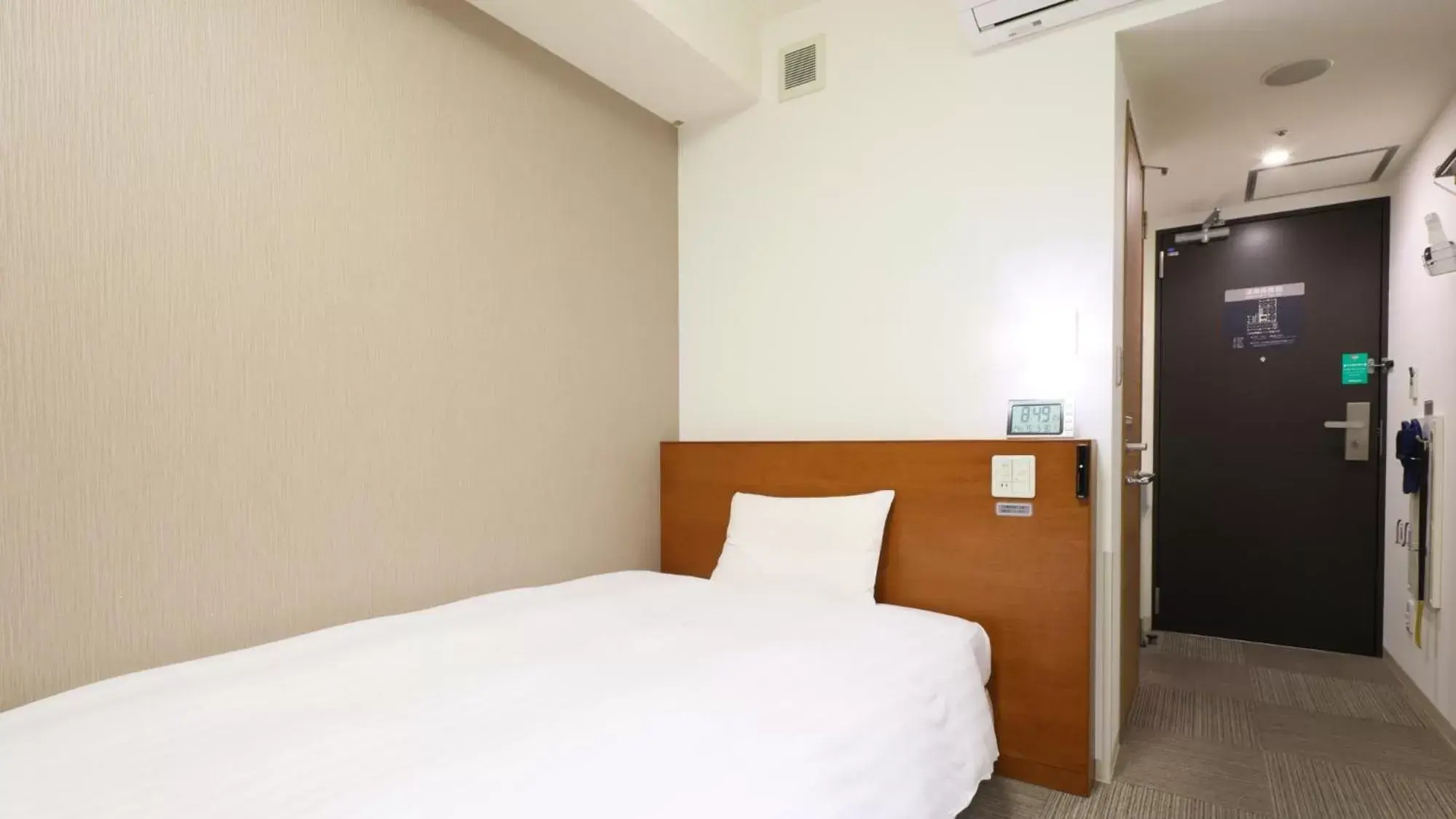 Bed in Dormy Inn Takamatsu