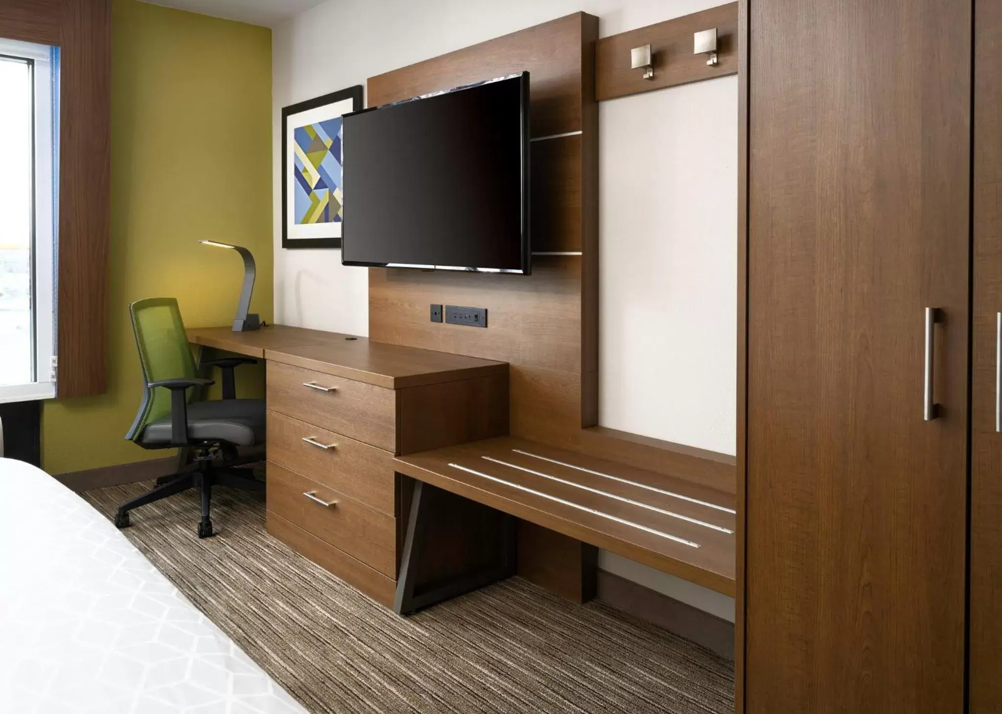 Photo of the whole room, TV/Entertainment Center in Holiday Inn Express Hotel & Suites Olive Branch, an IHG Hotel