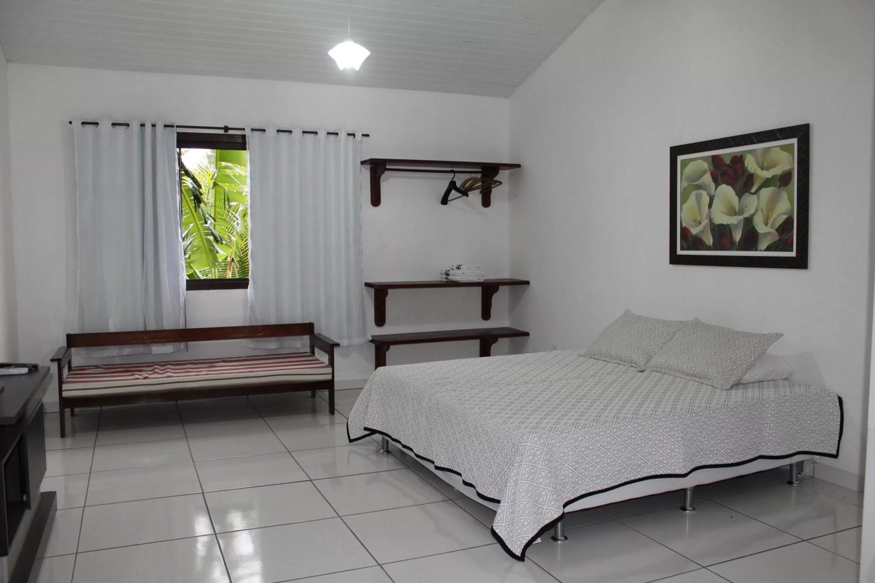 Bed in Pousada Recanto Das Emerências