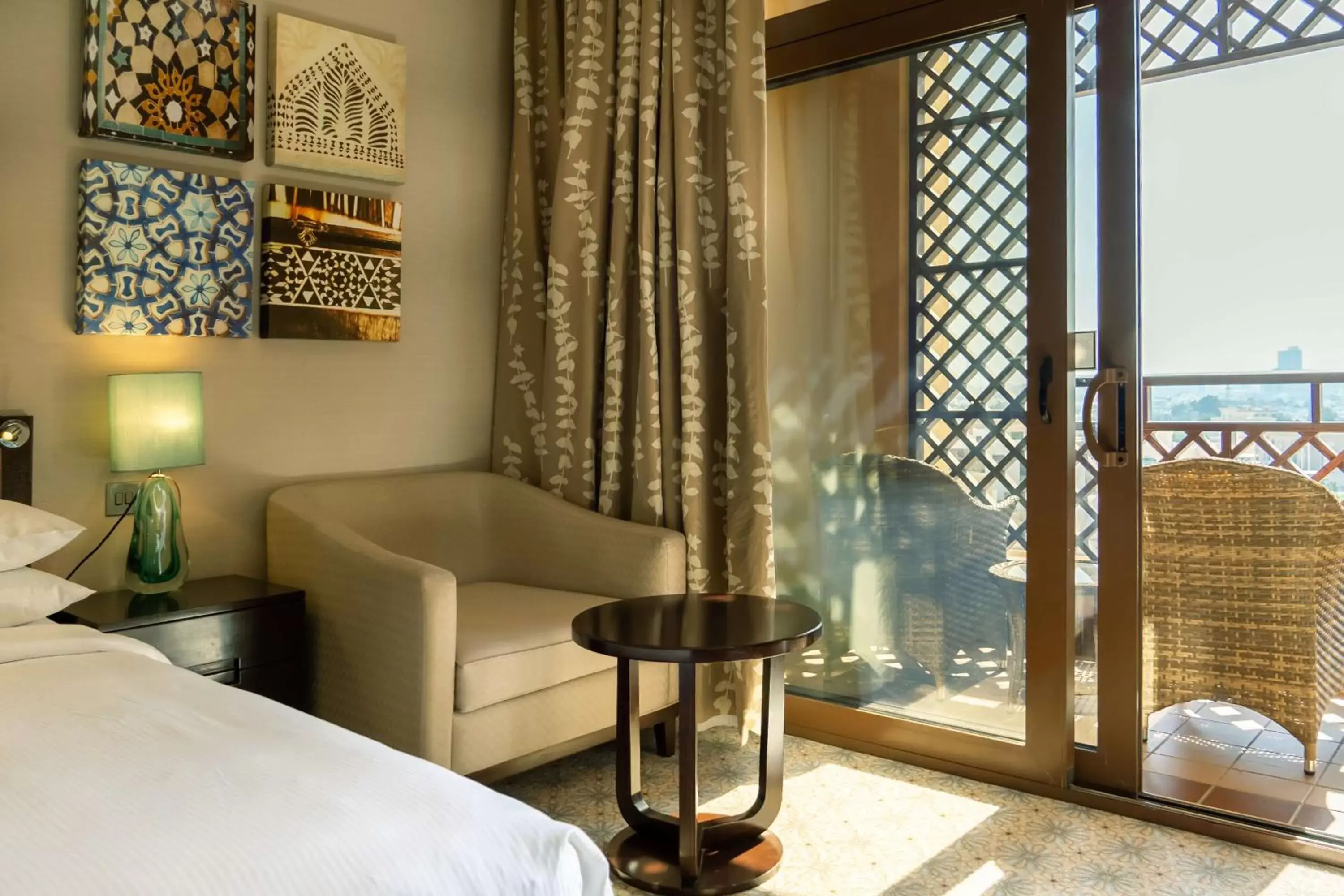 Bed, Seating Area in Hilton Ras Al Khaimah Beach Resort