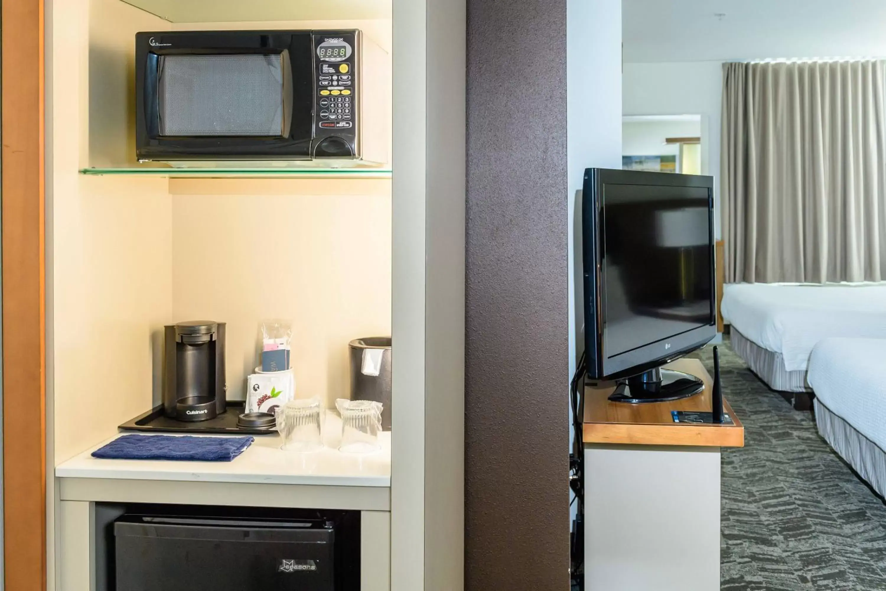 Photo of the whole room, TV/Entertainment Center in SpringHill Suites Houston NASA/Seabrook