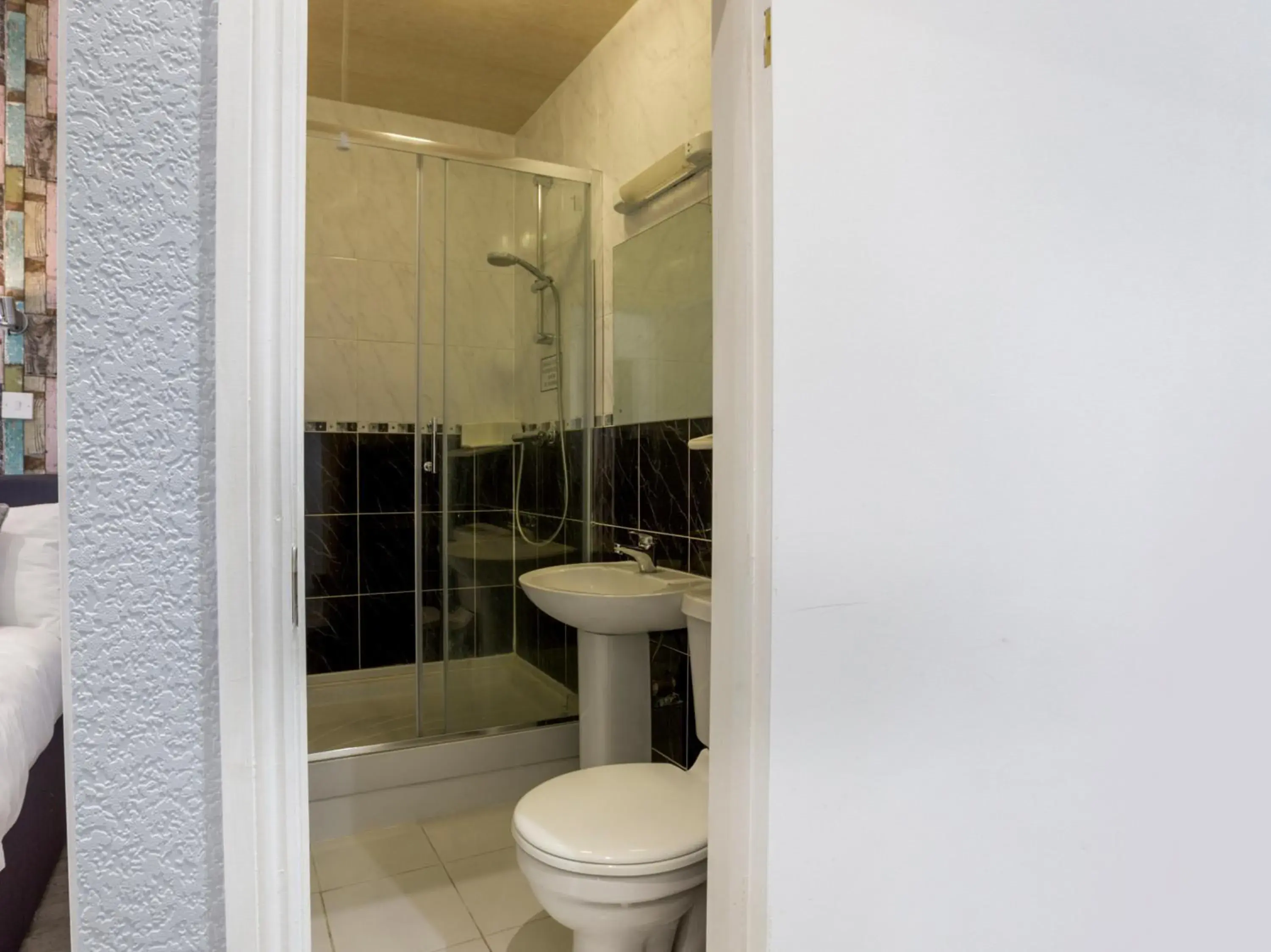 Bathroom in OYO Sino Hotel
