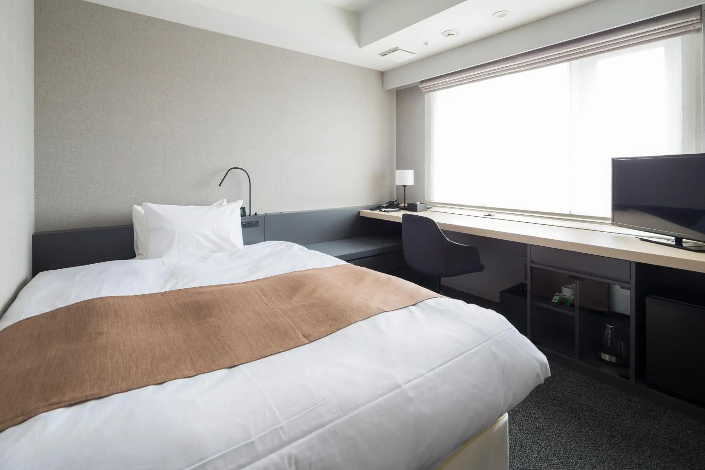 Bed in Hotel Granbinario Komatsu Bed in Hotel Granbinario Komatsu