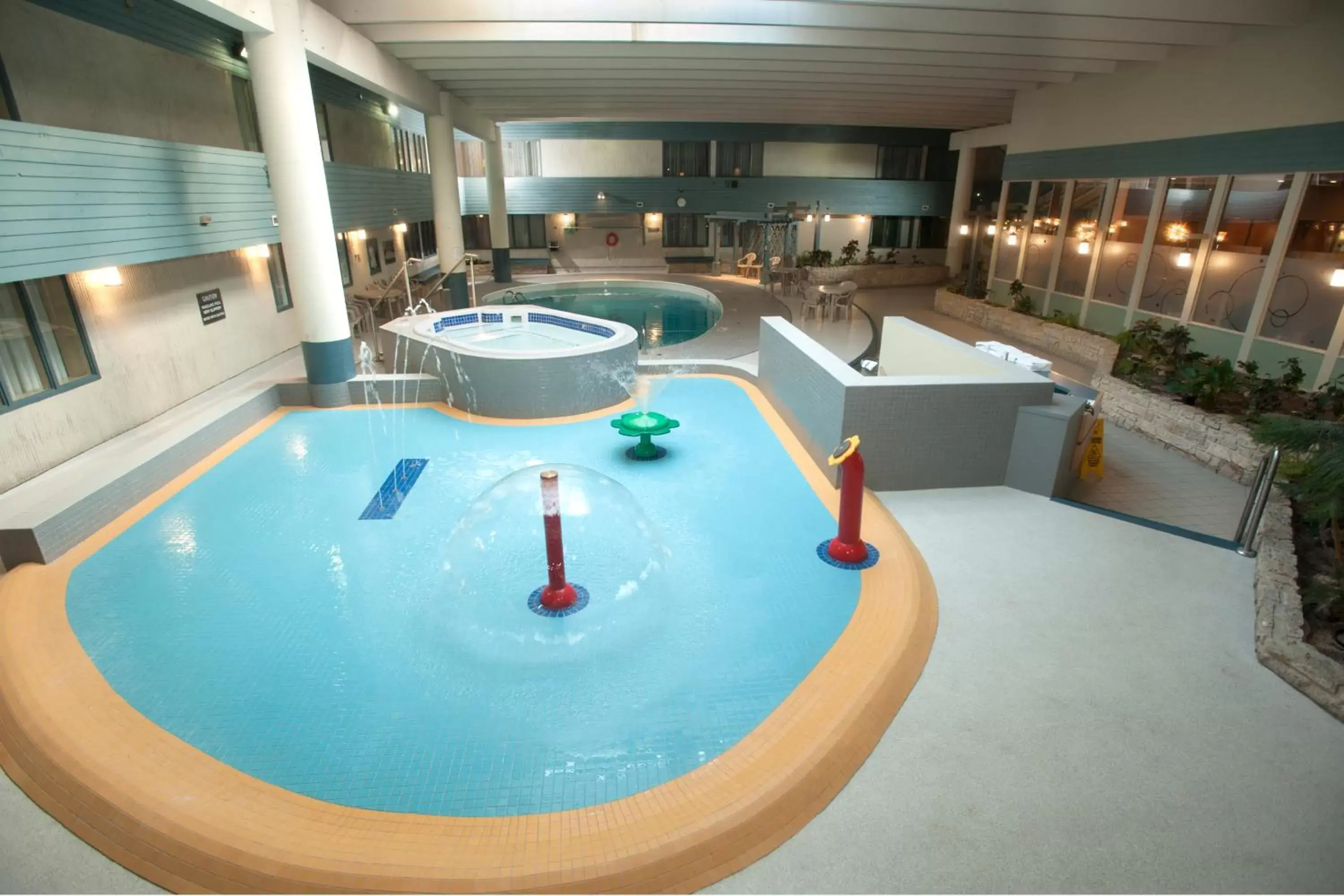 Swimming pool in Travelodge Hotel by Wyndham Saskatoon