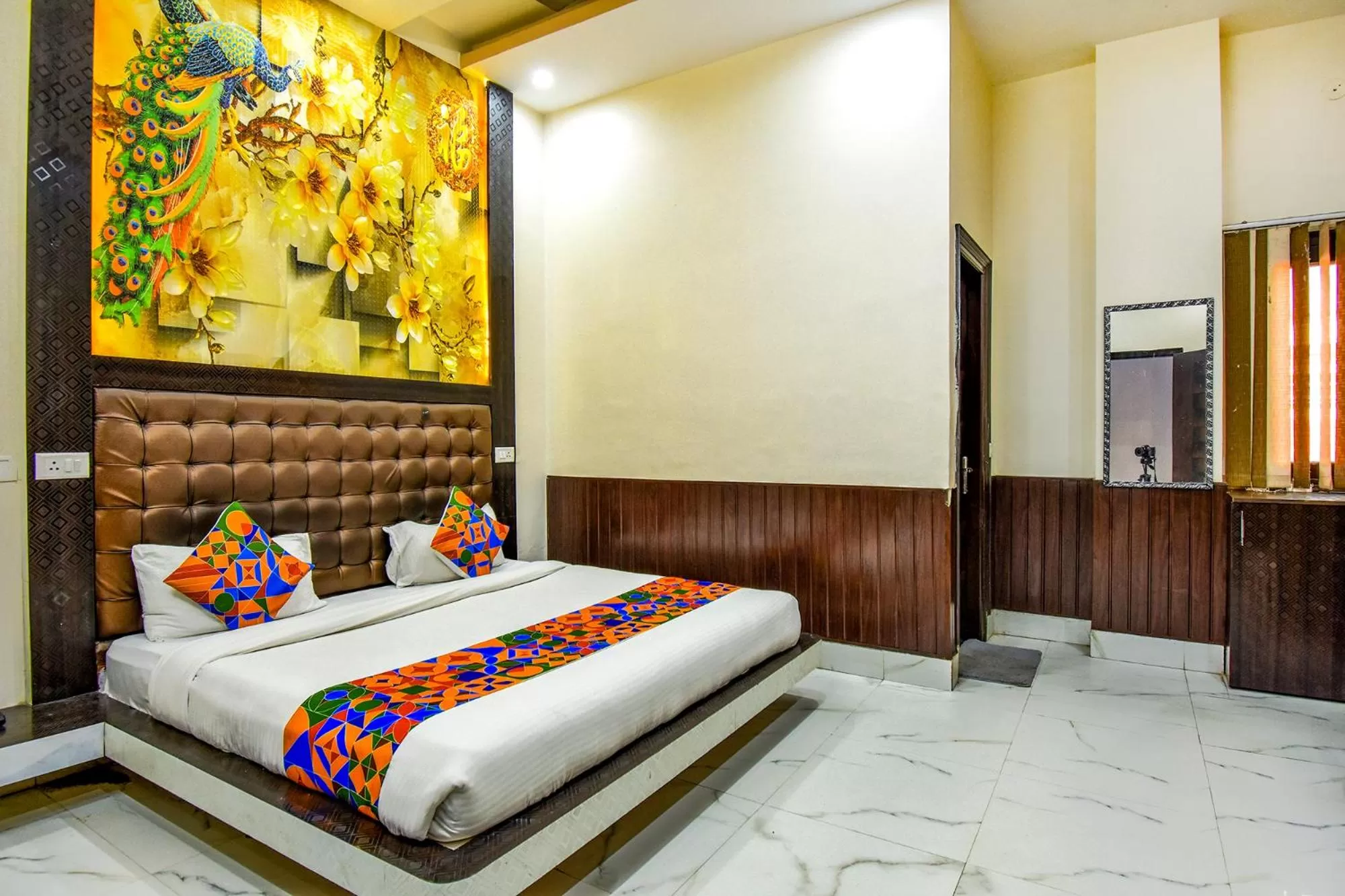 Bed in FabHotel Prime Sumanglam