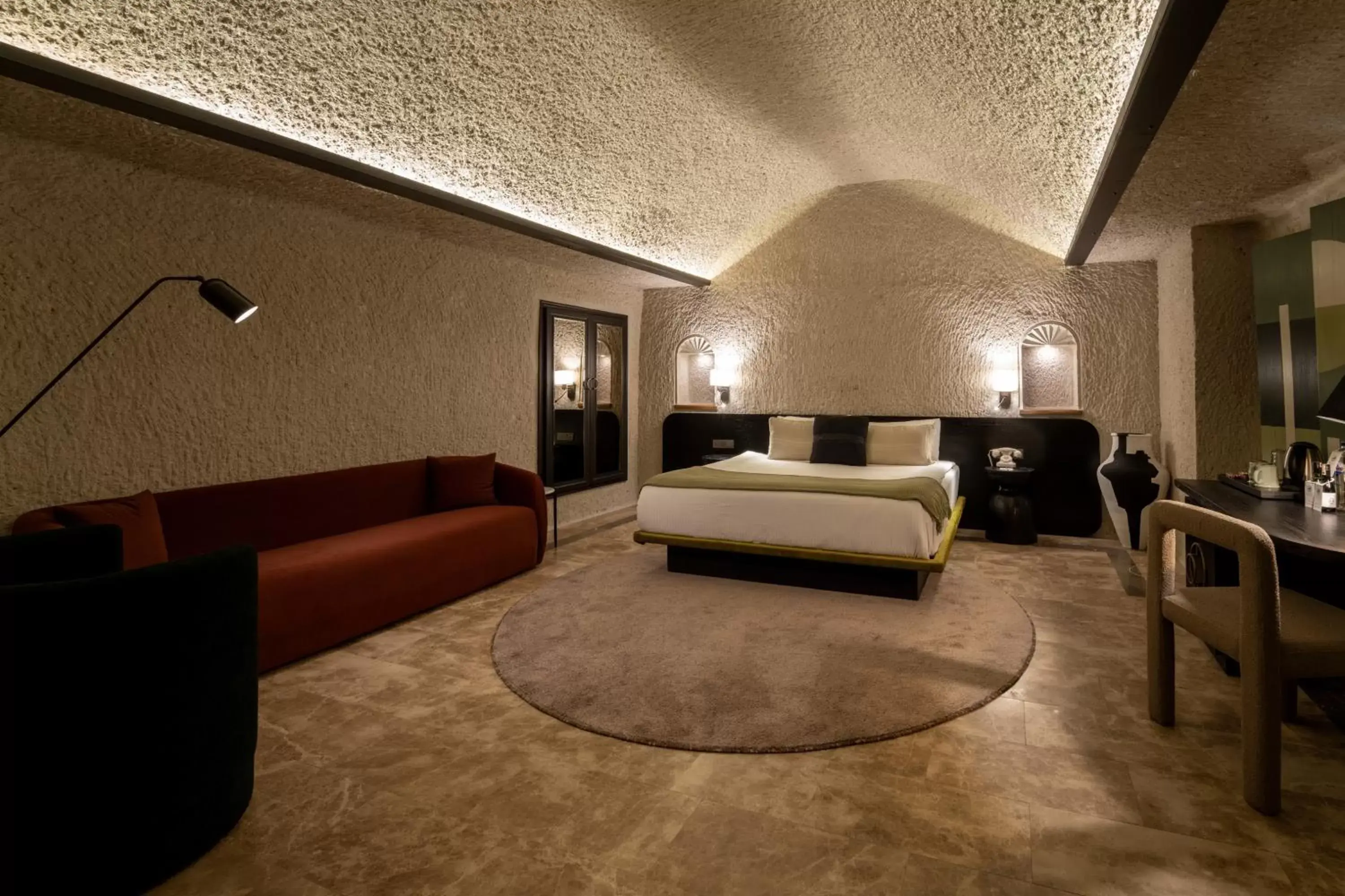 Bedroom, Seating Area in Artemis Cave Suites & Spa- Adults Only