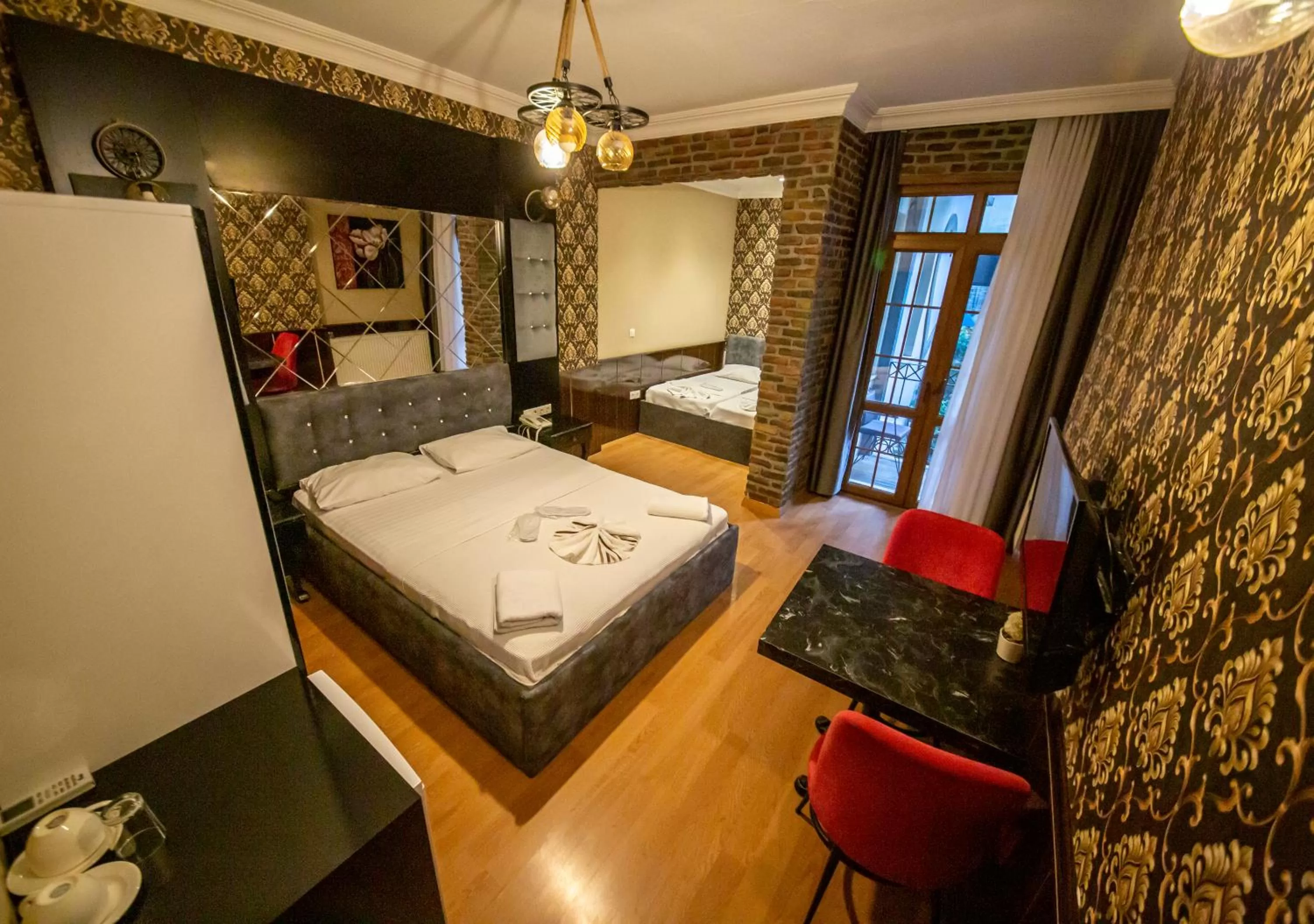 Bed in Royal Palace Hotel