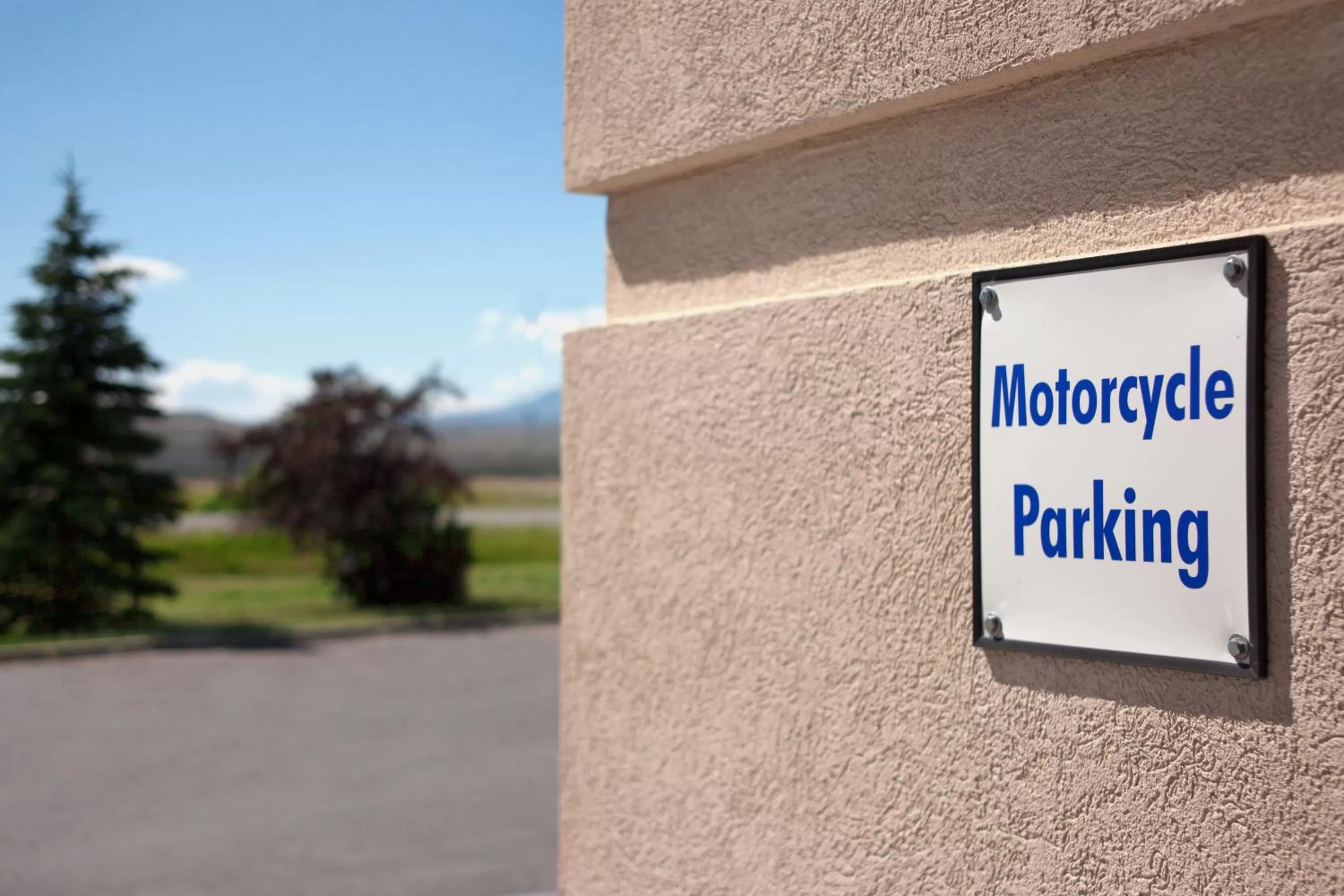 Property logo or sign in Super 8 by Wyndham Big Timber