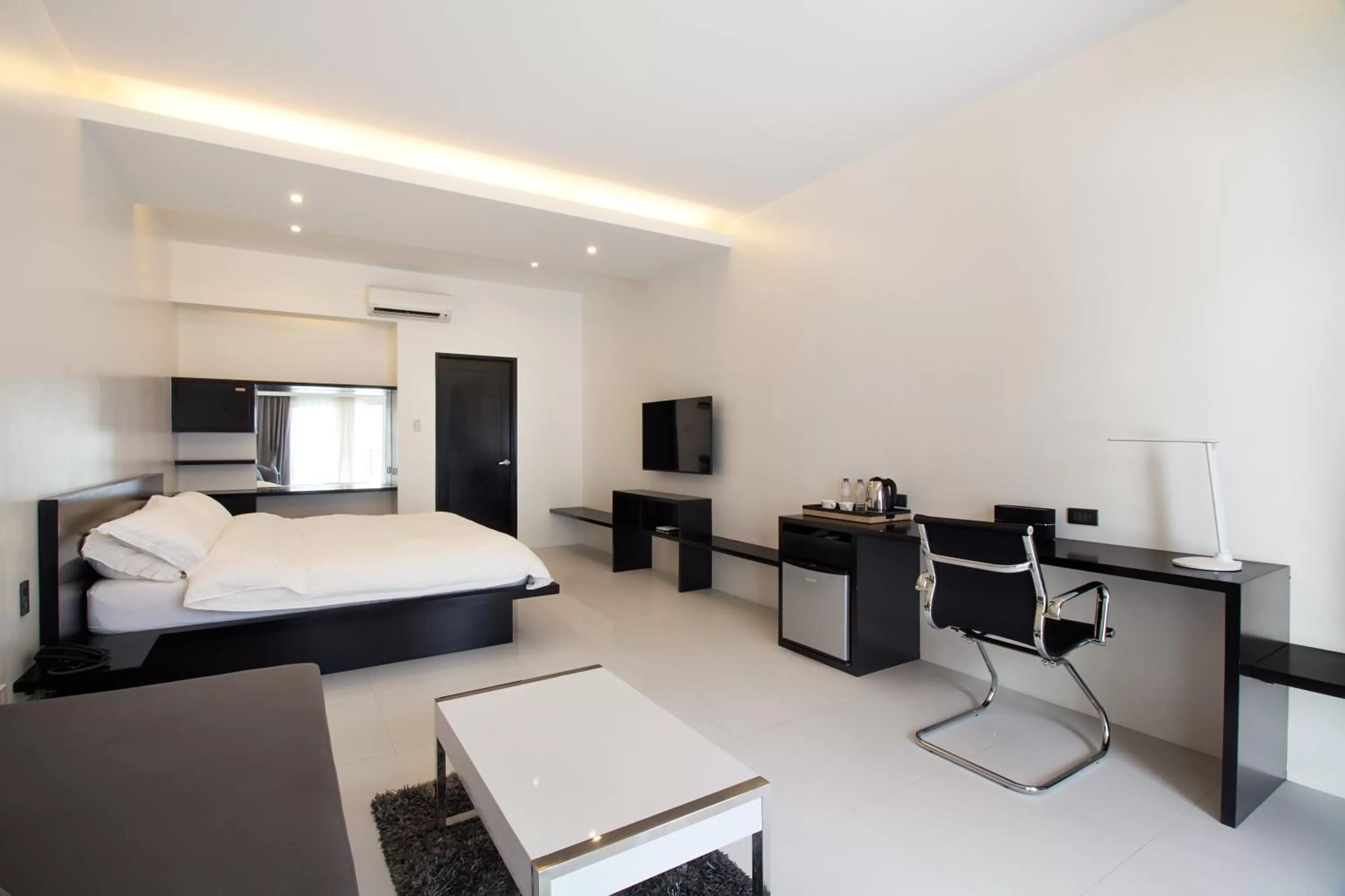 Photo of the whole room, Bed in Winds Boutique Hotel