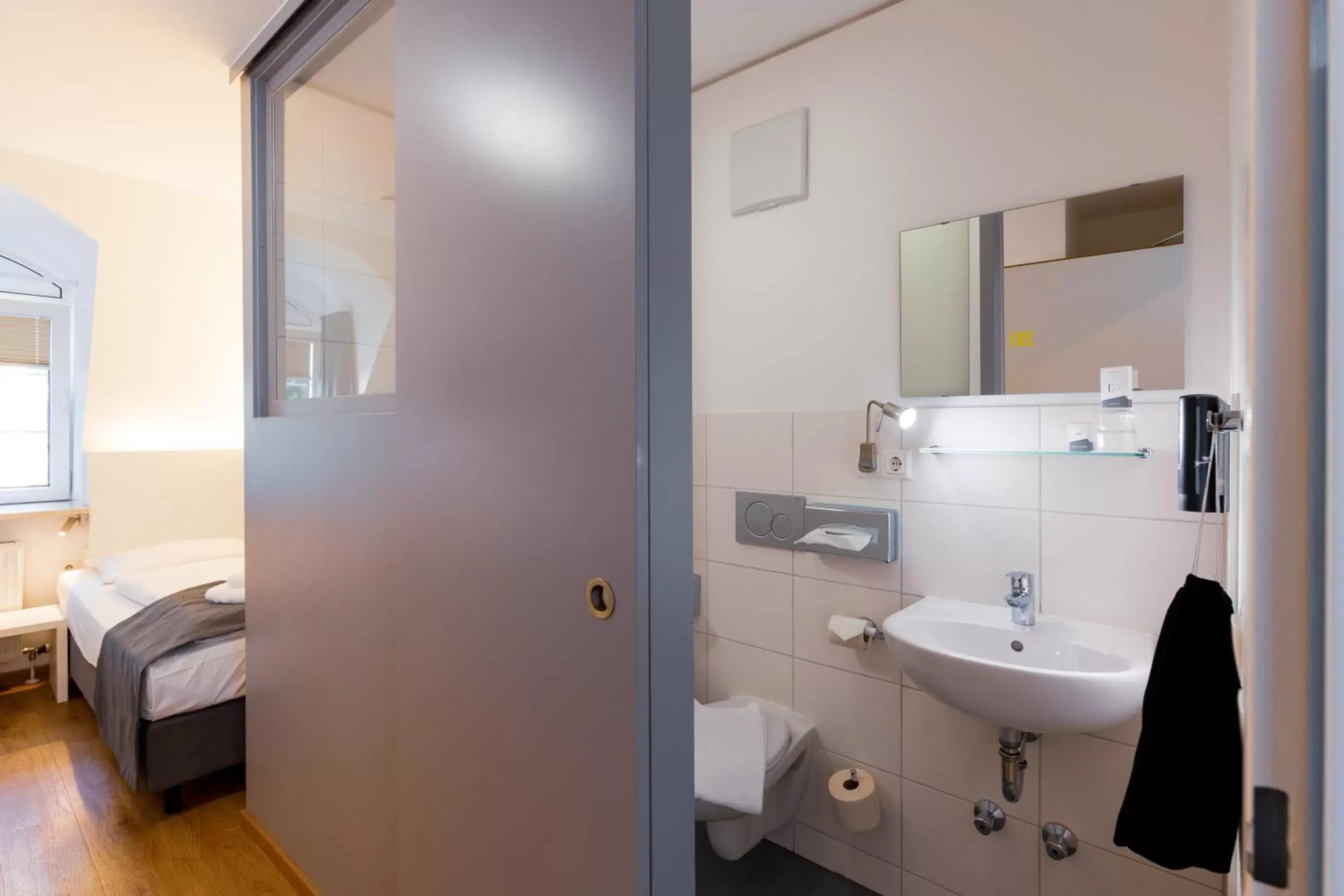 Toilet, Bathroom in mk hotel münchen max-weber-platz