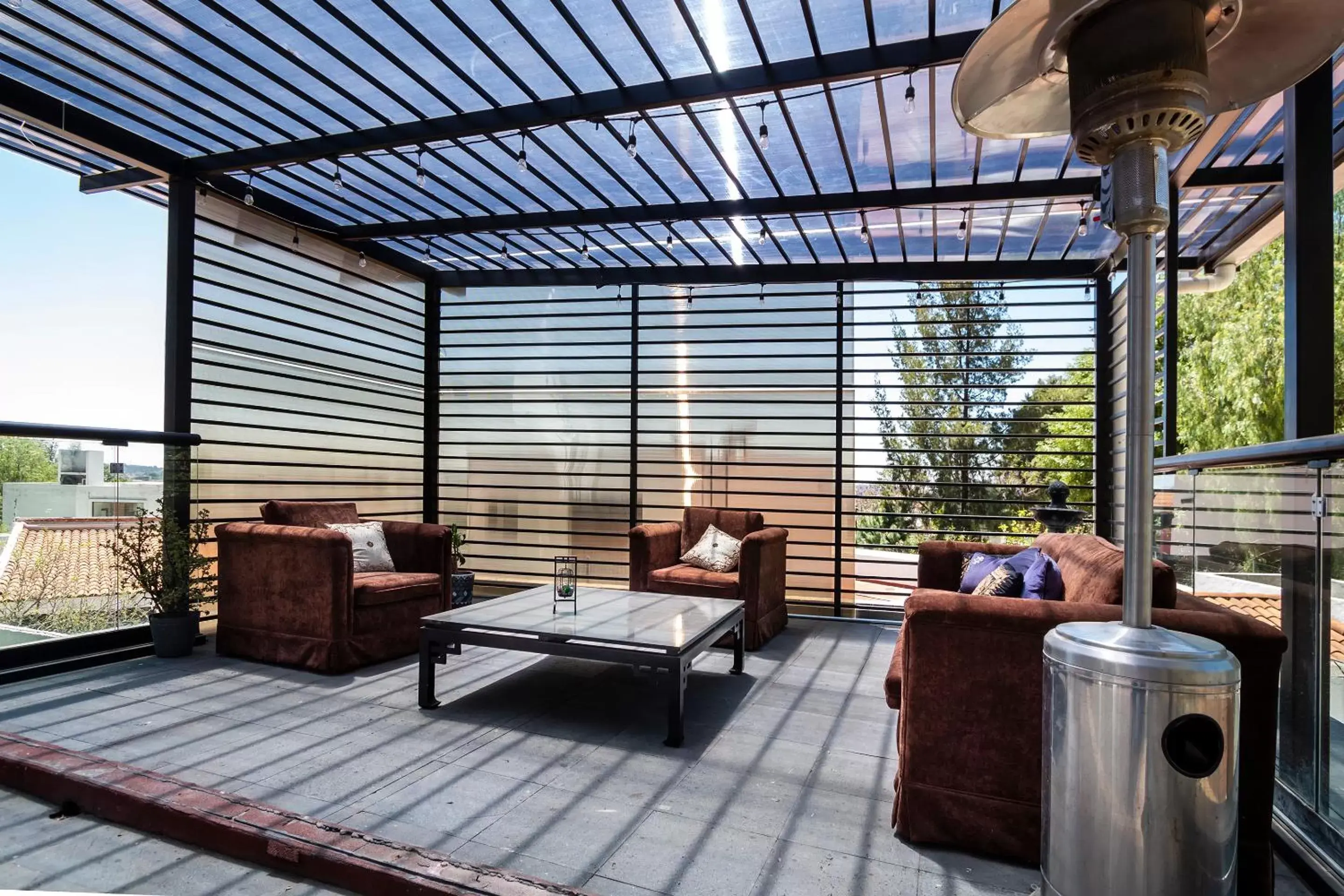 Seating area in Hotel Boutique Camino Del Bosque by Rotamundos