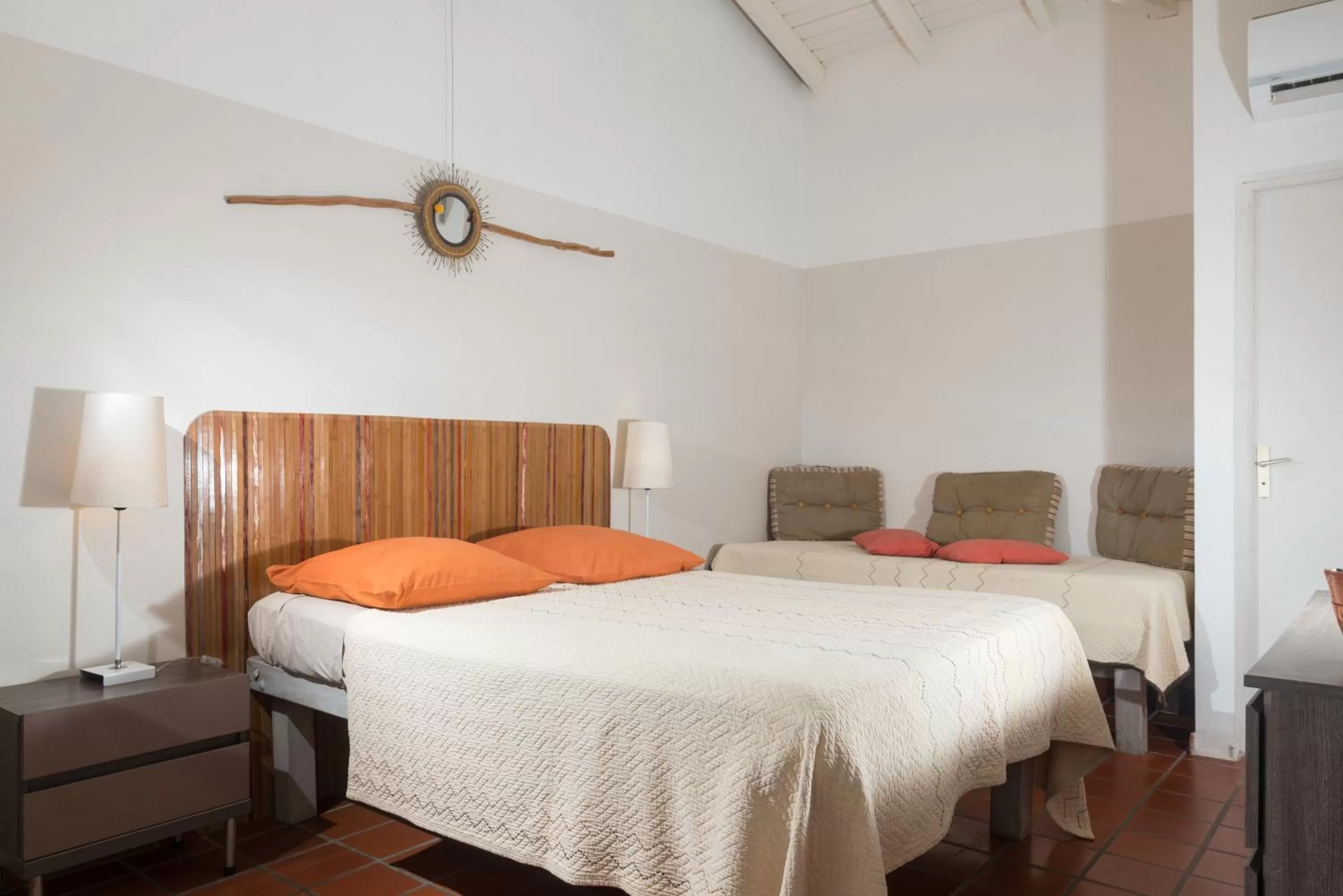 Photo of the whole room, Bed in Hôtel Les Bananiers