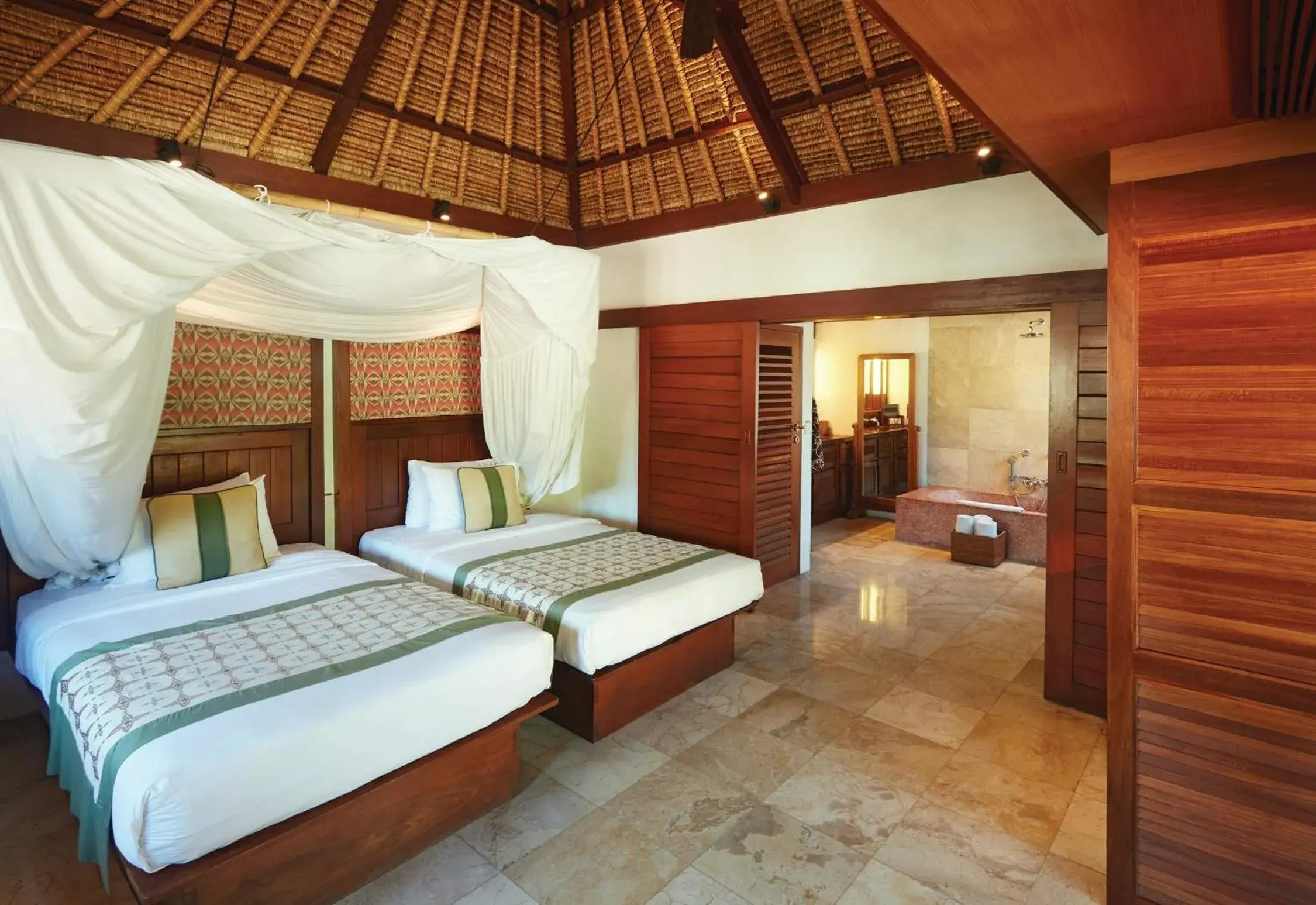 Bathroom, Bed in Jimbaran Puri, A Belmond Hotel, Bali