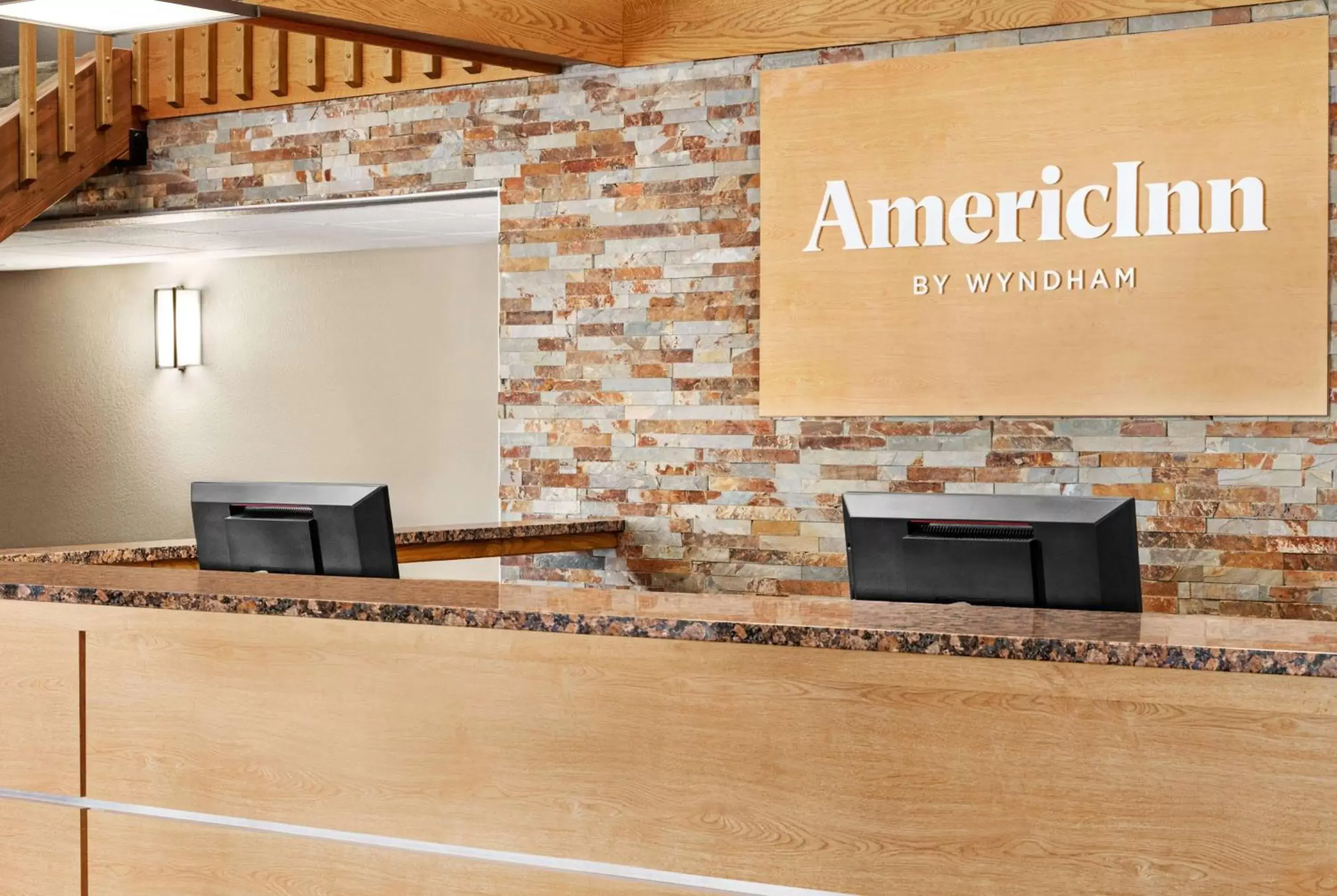 Lobby or reception in AmericInn by Wyndham Roseau