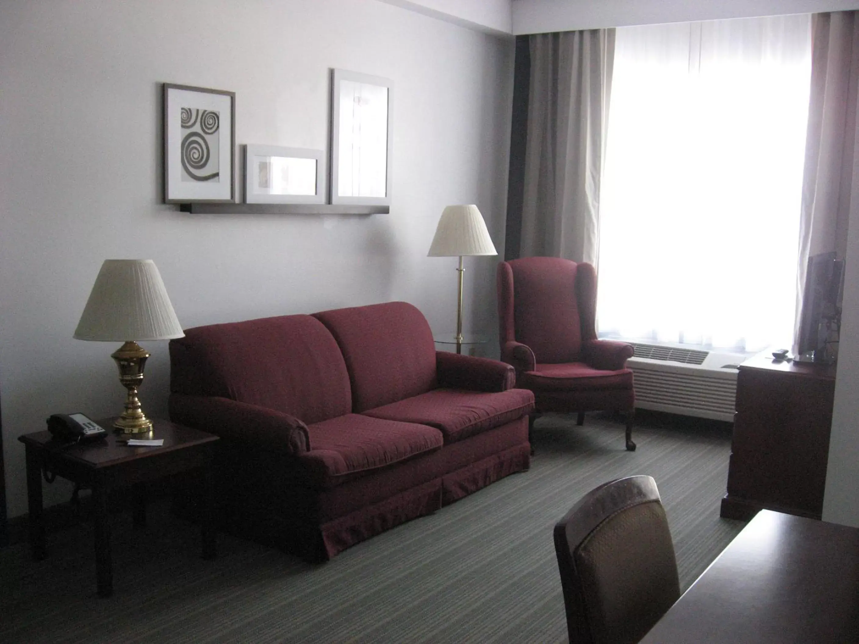 Living room, Seating Area in Country Inn & Suites by Radisson, Wausau, WI