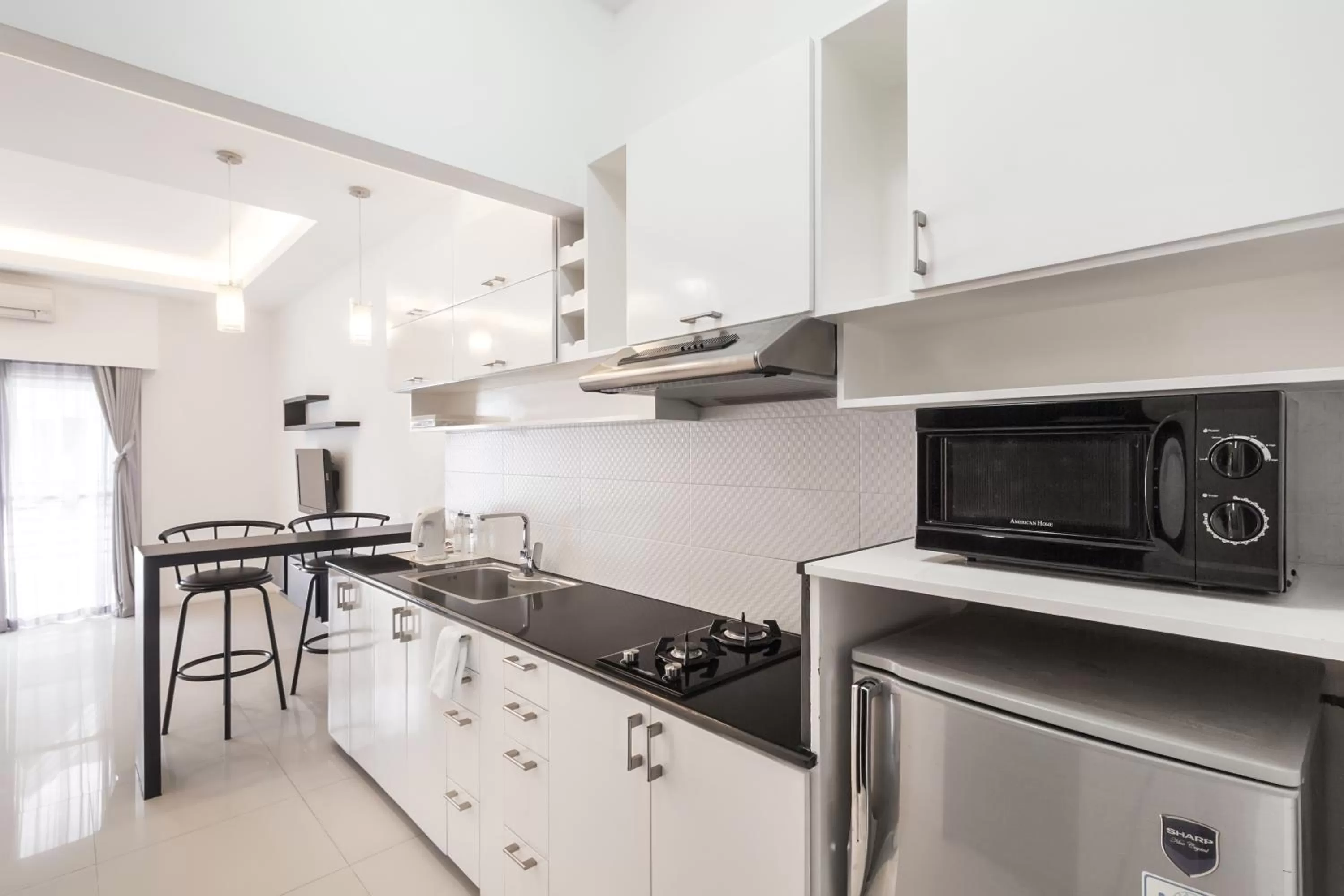 Kitchen or kitchenette in Winds Boutique Hotel