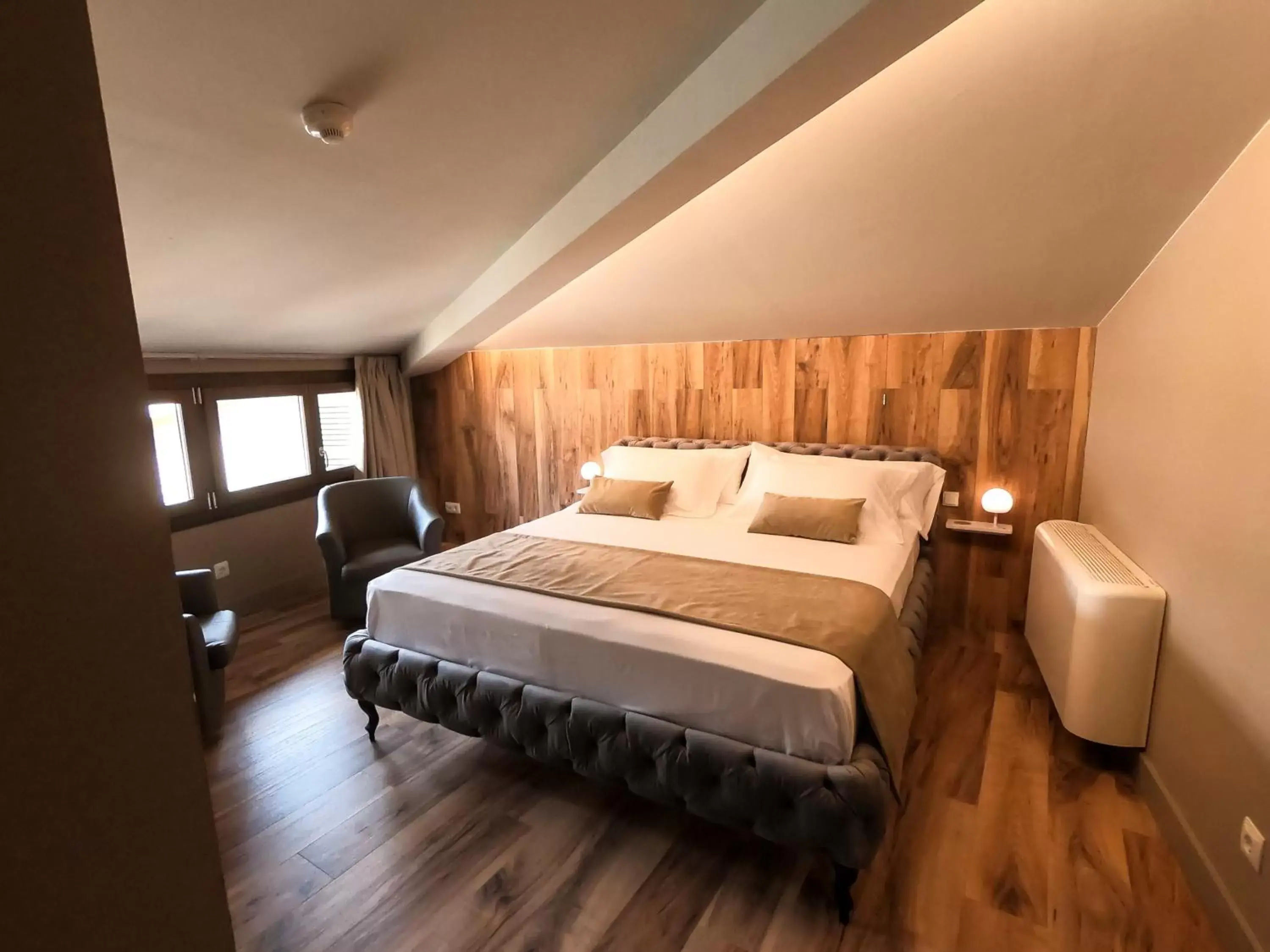 Bed in Les Clarisses Boutique Hotel