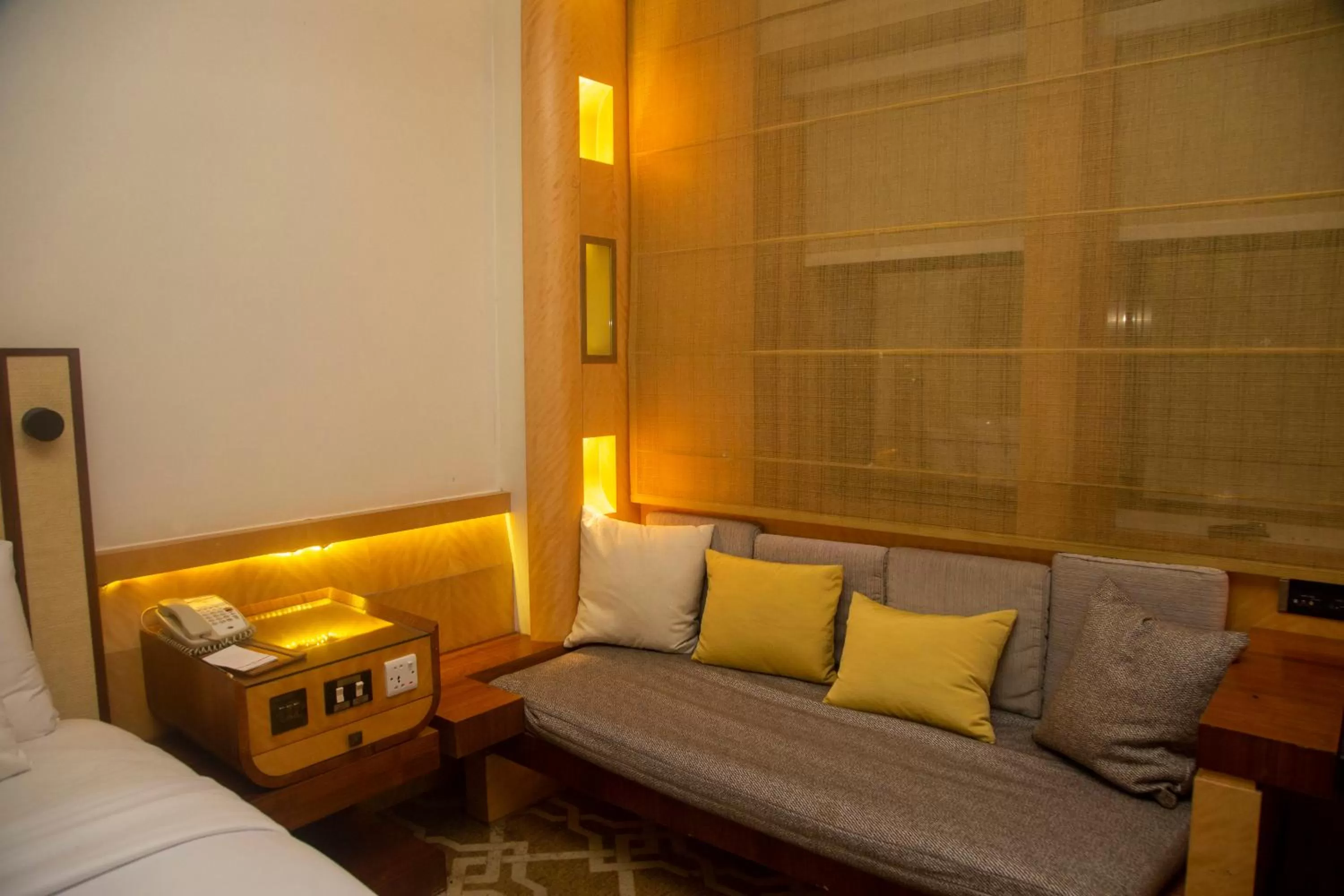 Seating area, Bed in Marco Polo Hotel