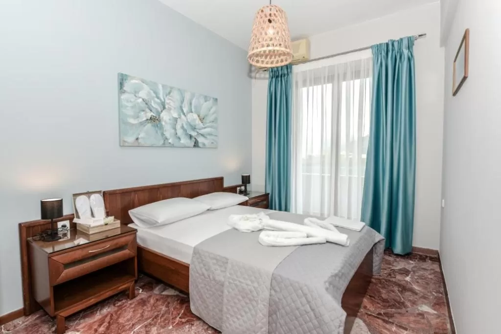 Bed in V & G Cozy Apartments