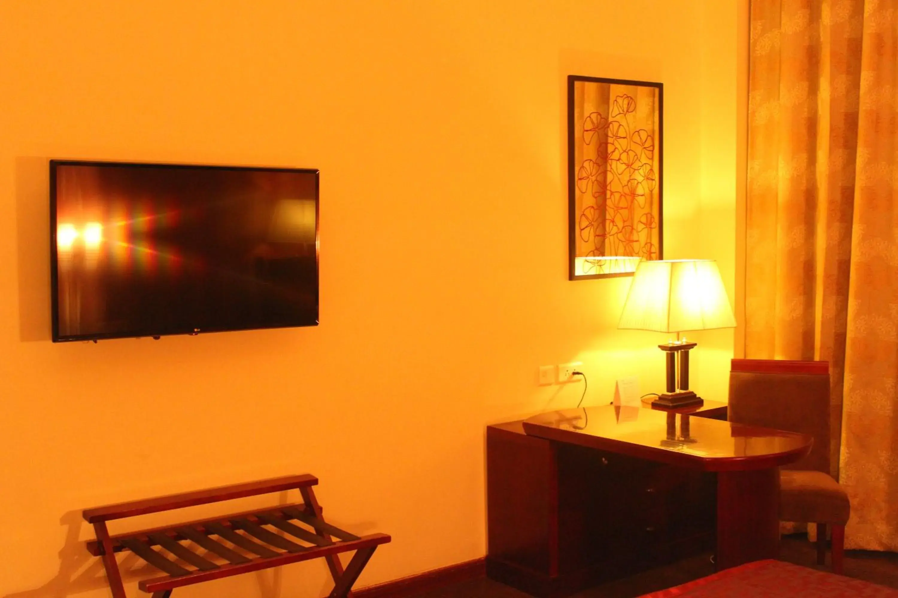 TV and multimedia, TV/Entertainment Center in Ramada by Wyndham Jaipur Jaisinghpura