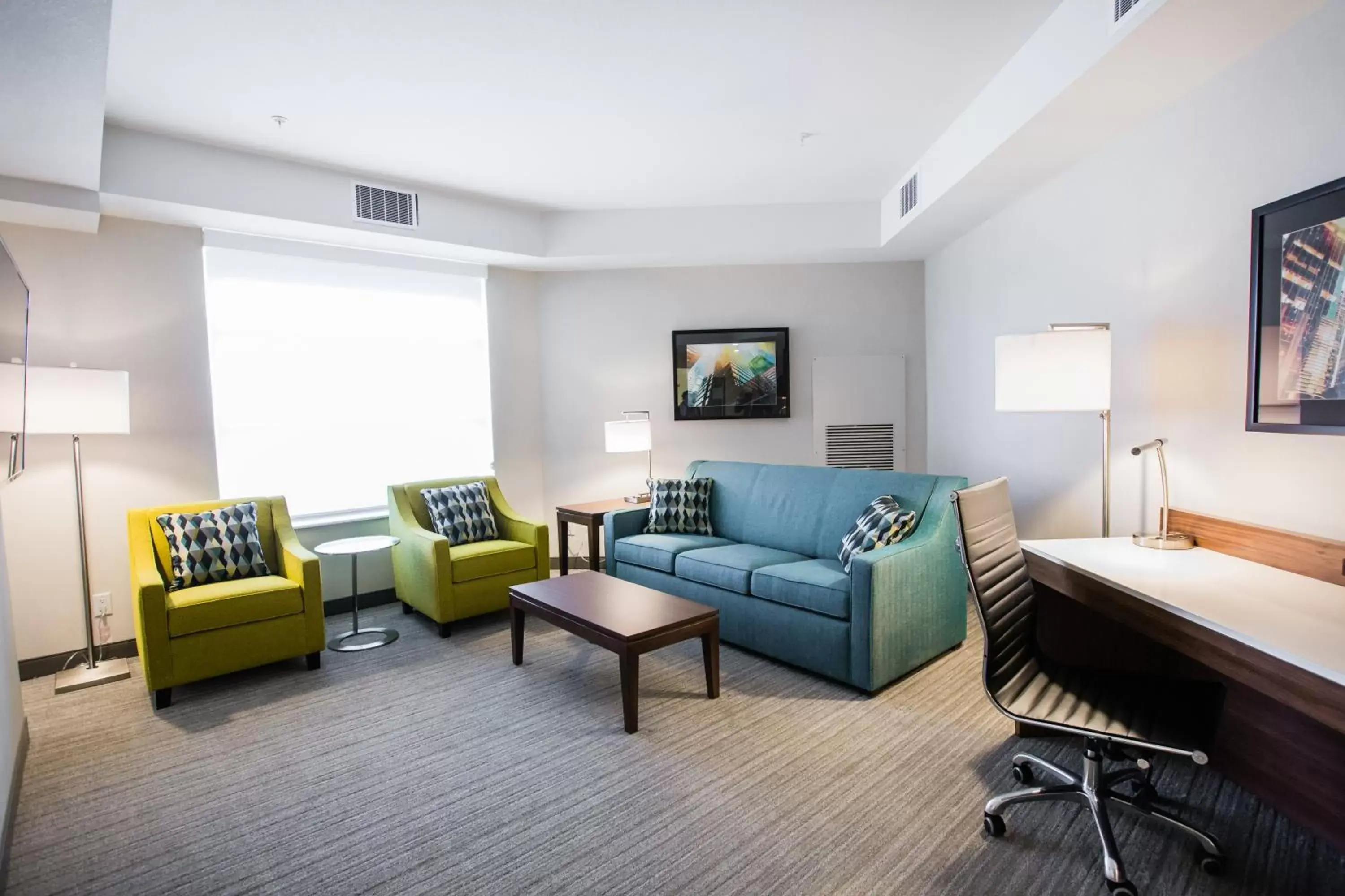 Photo of the whole room, Seating Area in Holiday Inn Hotel & Suites Calgary South - Conference Ctr, an IHG Hotel