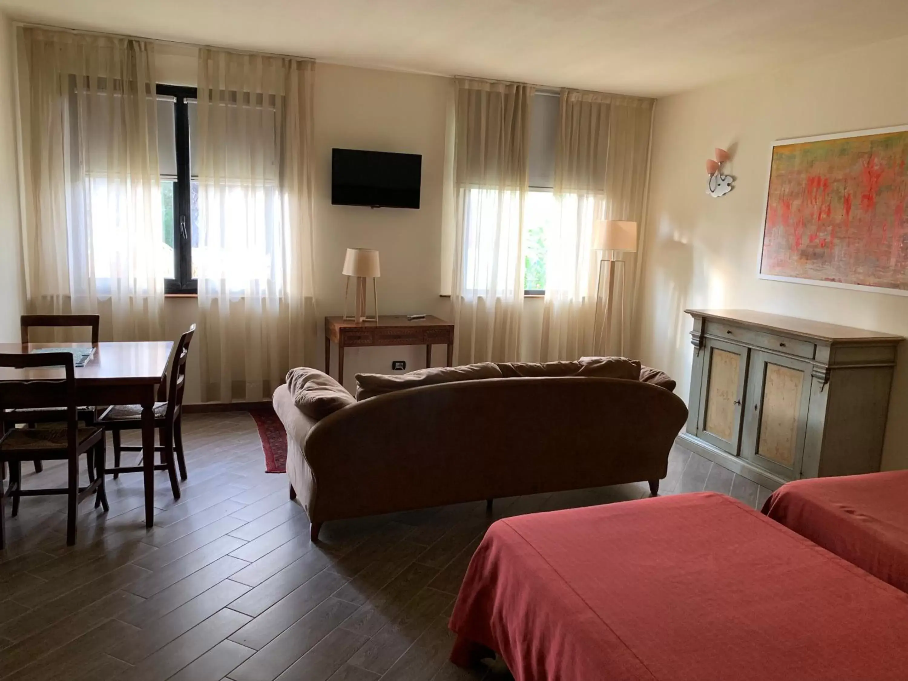 Bed, TV/Entertainment Center in Hotel Il Casale Verde Resort