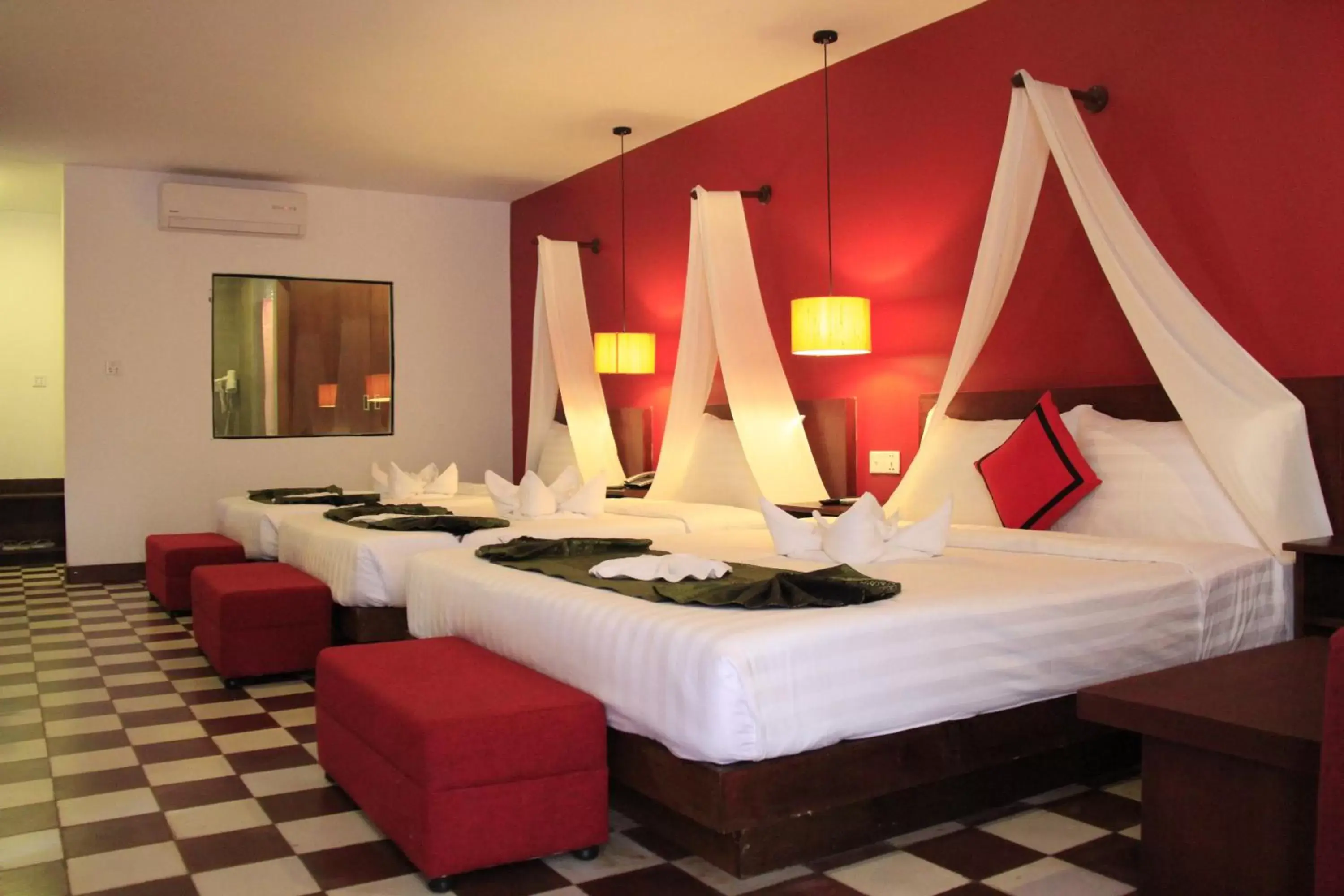 Bed in Mekong Angkor Palace Hotel